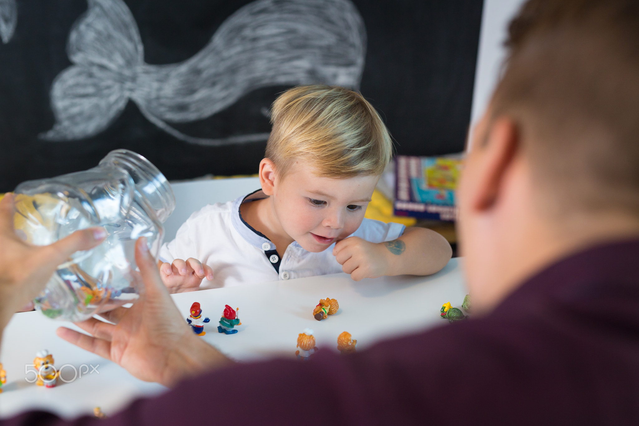 Cute little toddler boy at child therapy session.