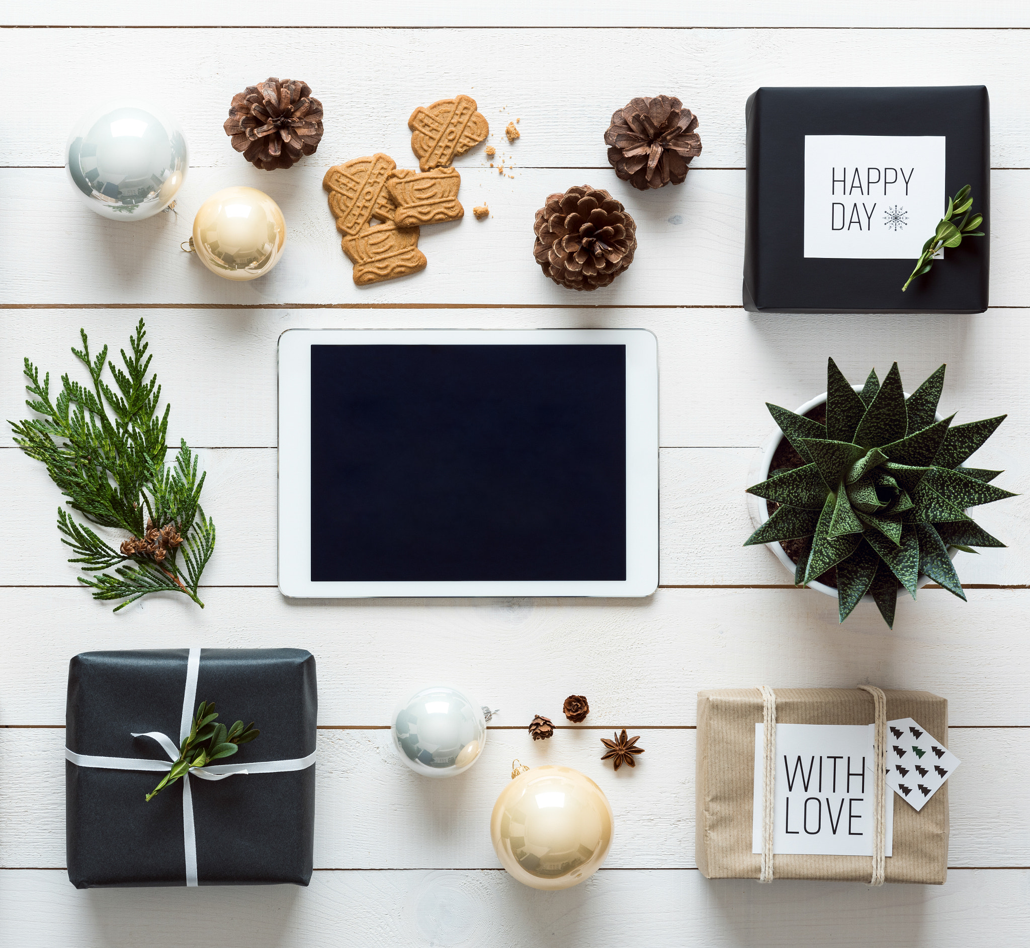 Elegant nordic retro christmas background, desk view from above, online shopping concept