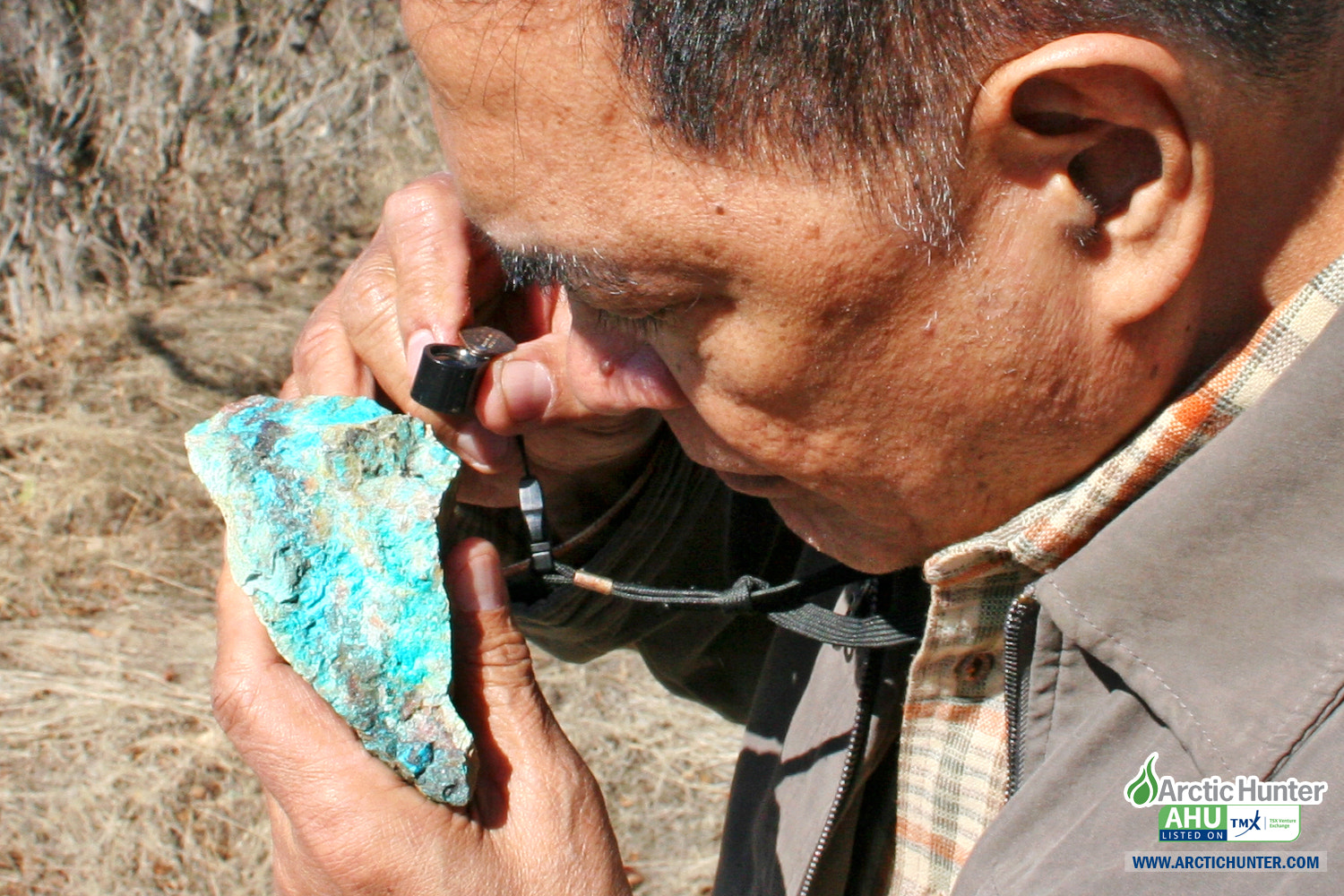 Examining a copper specimen © Arctic Hunter Energy Inc. (TSX-V: