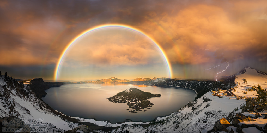 Crater lake with double rainbow and lightning bolt by William Lee on 500px.com