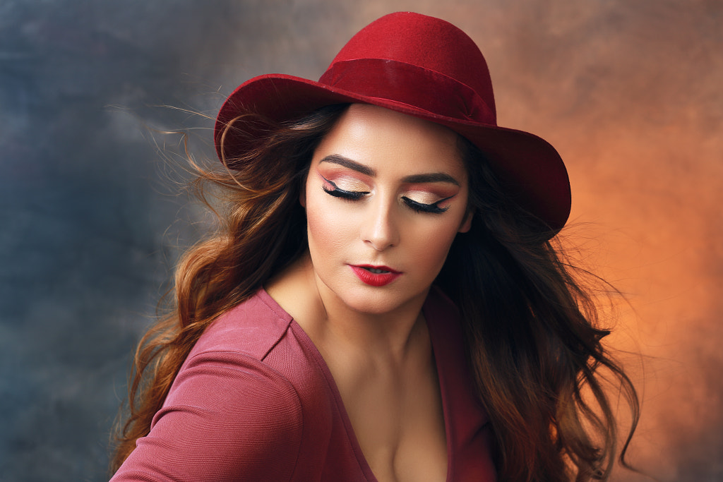 woman in red dress and red hat by Olena Zaskochenko on 500px