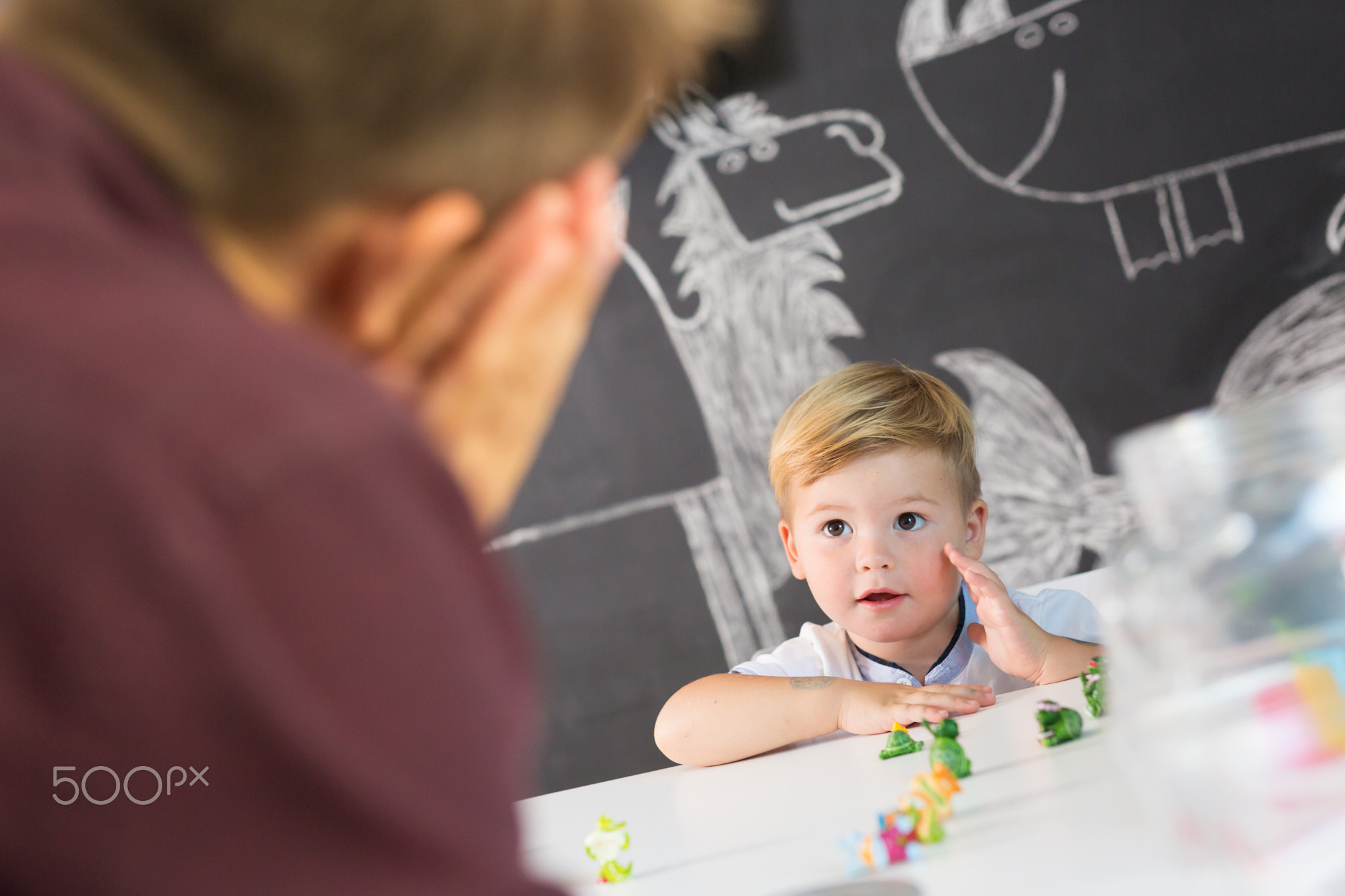 Cute little toddler boy at child therapy session.