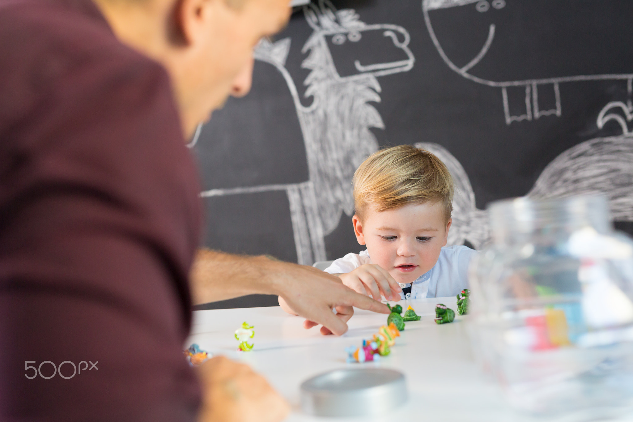 Cute little toddler boy at child therapy session.