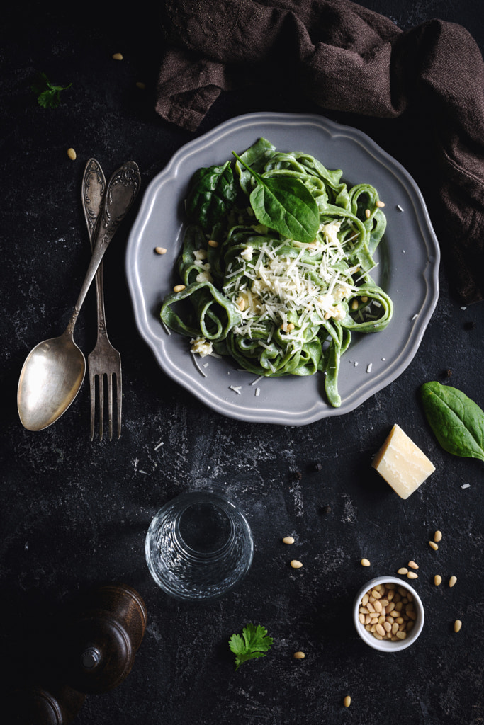 Healthy green spinach pasta with cheese by Vladislav Nosick on 500px.com