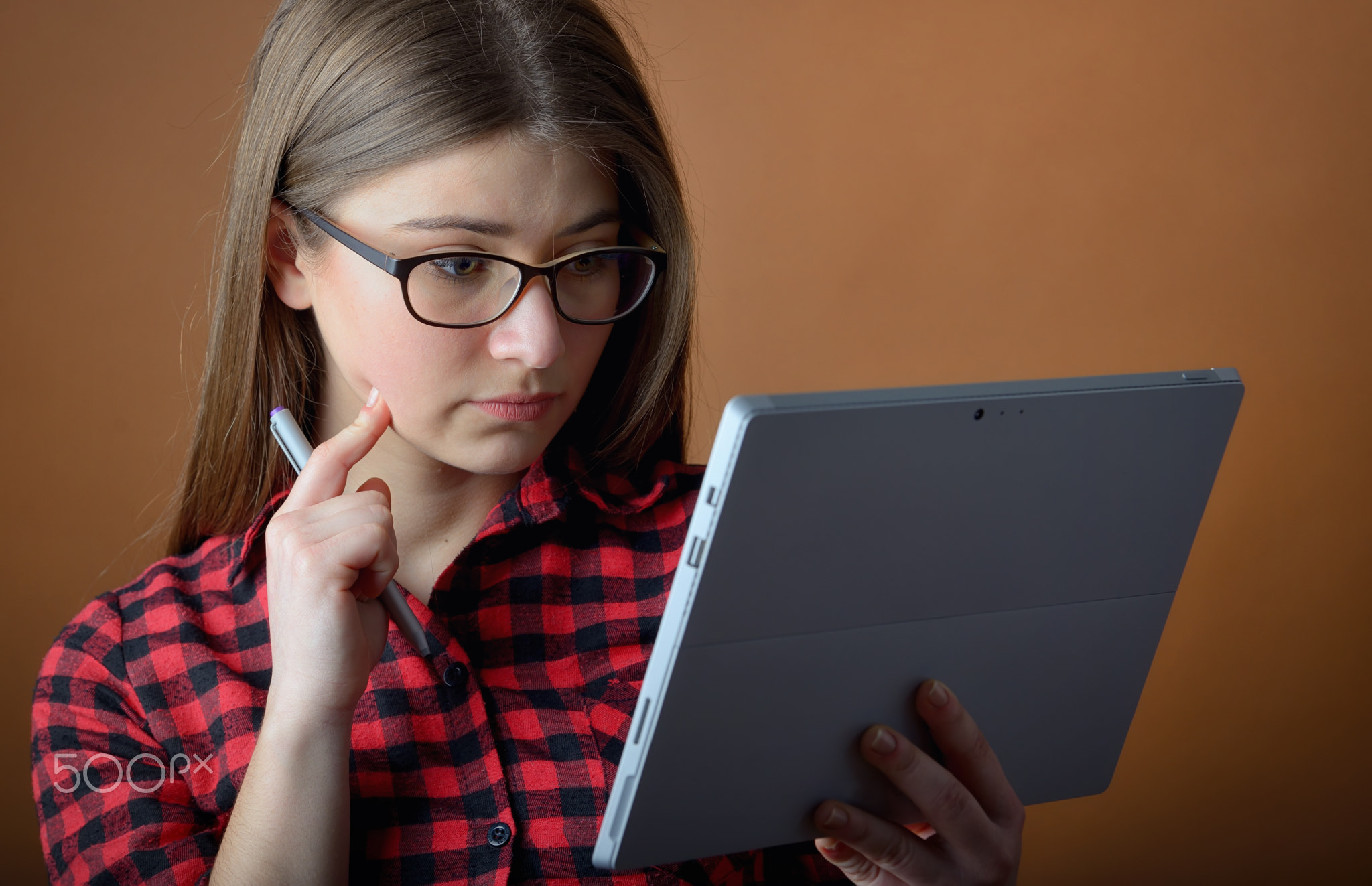 young teenage girl with a tablet