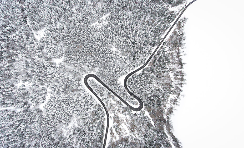 Red car on white by Chris Herzog on 500px.com