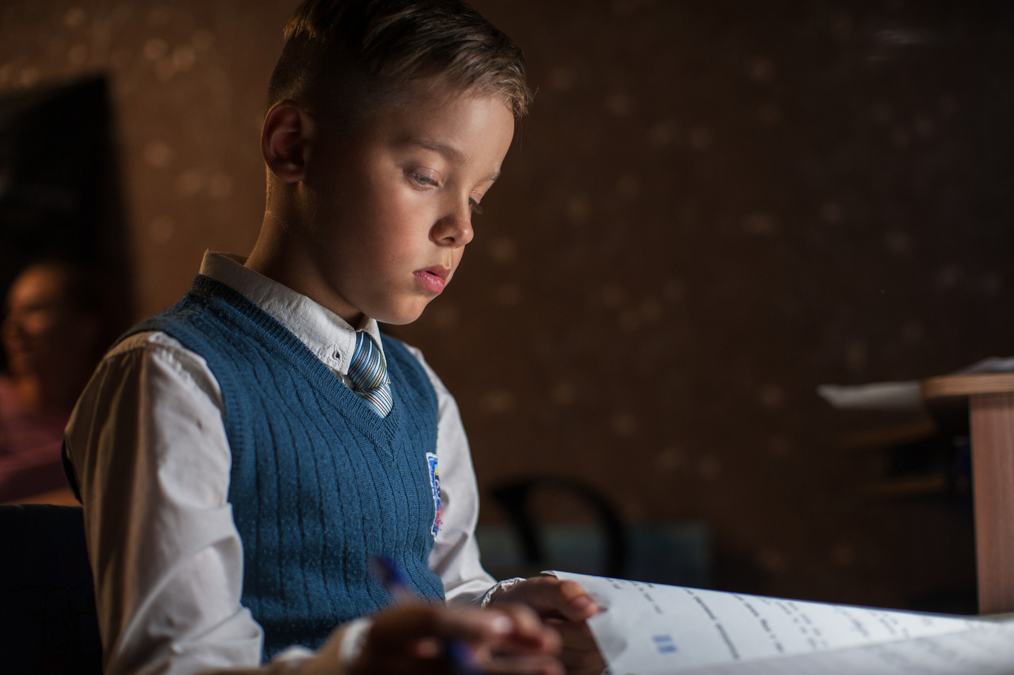 pupil boy does his homework