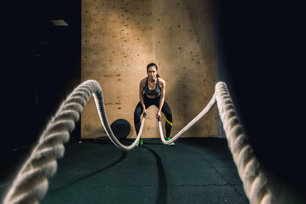 battling ropes girl at gym workout exercise fitted body by Ufa Bizphoto on 500px.com