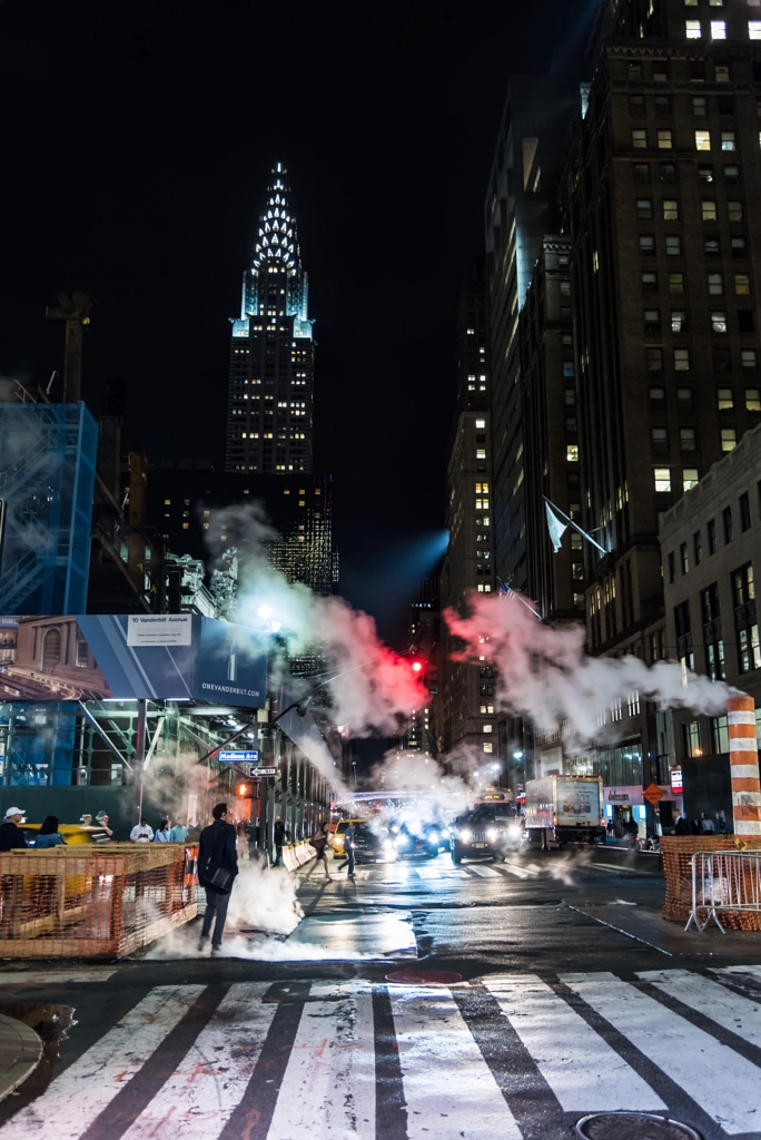 View of the Chrysler Building with steam rising from the street in New York City. by Javan Ng on 500px.com