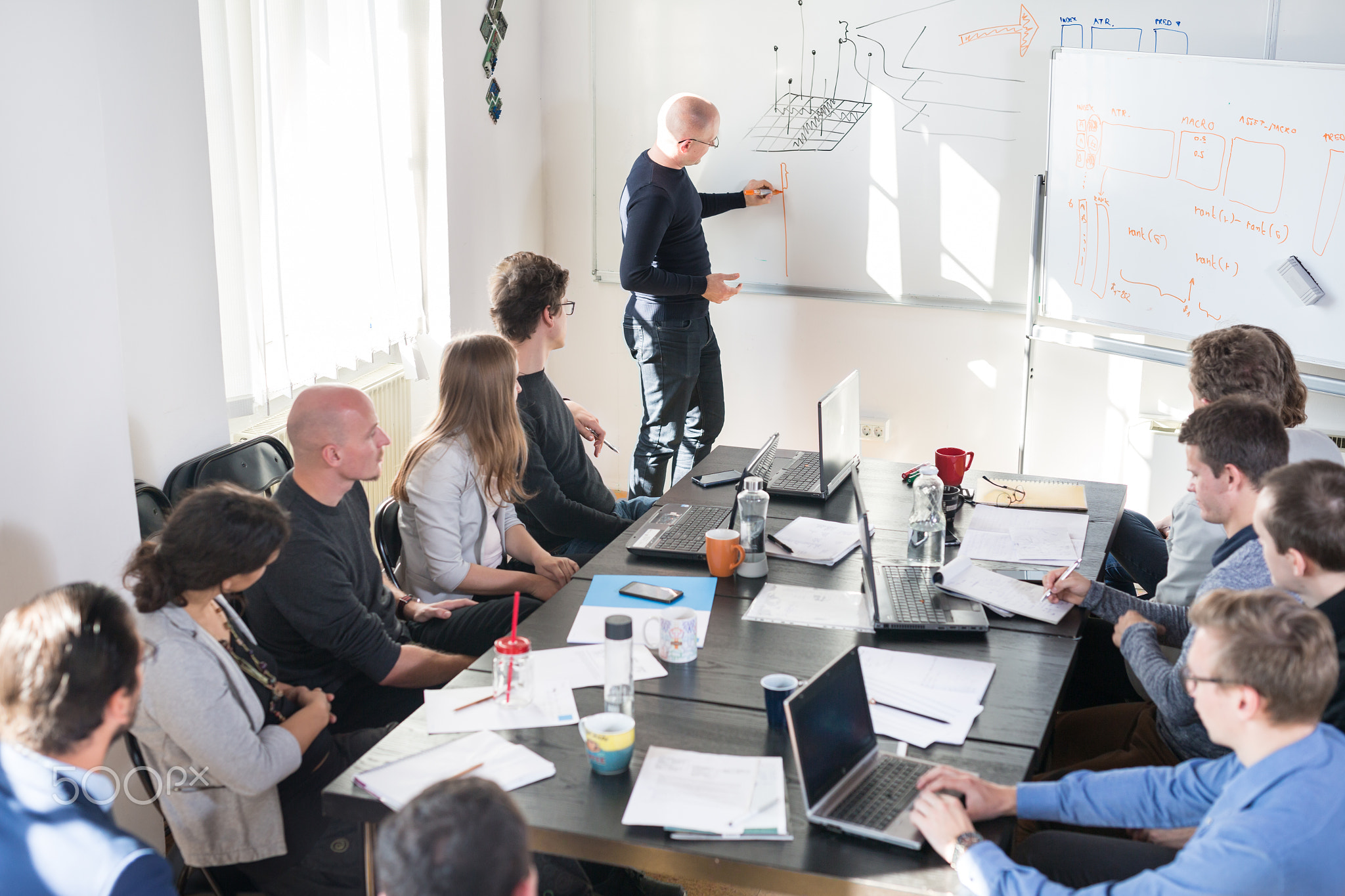 Relaxed informal IT business startup company team meeting.