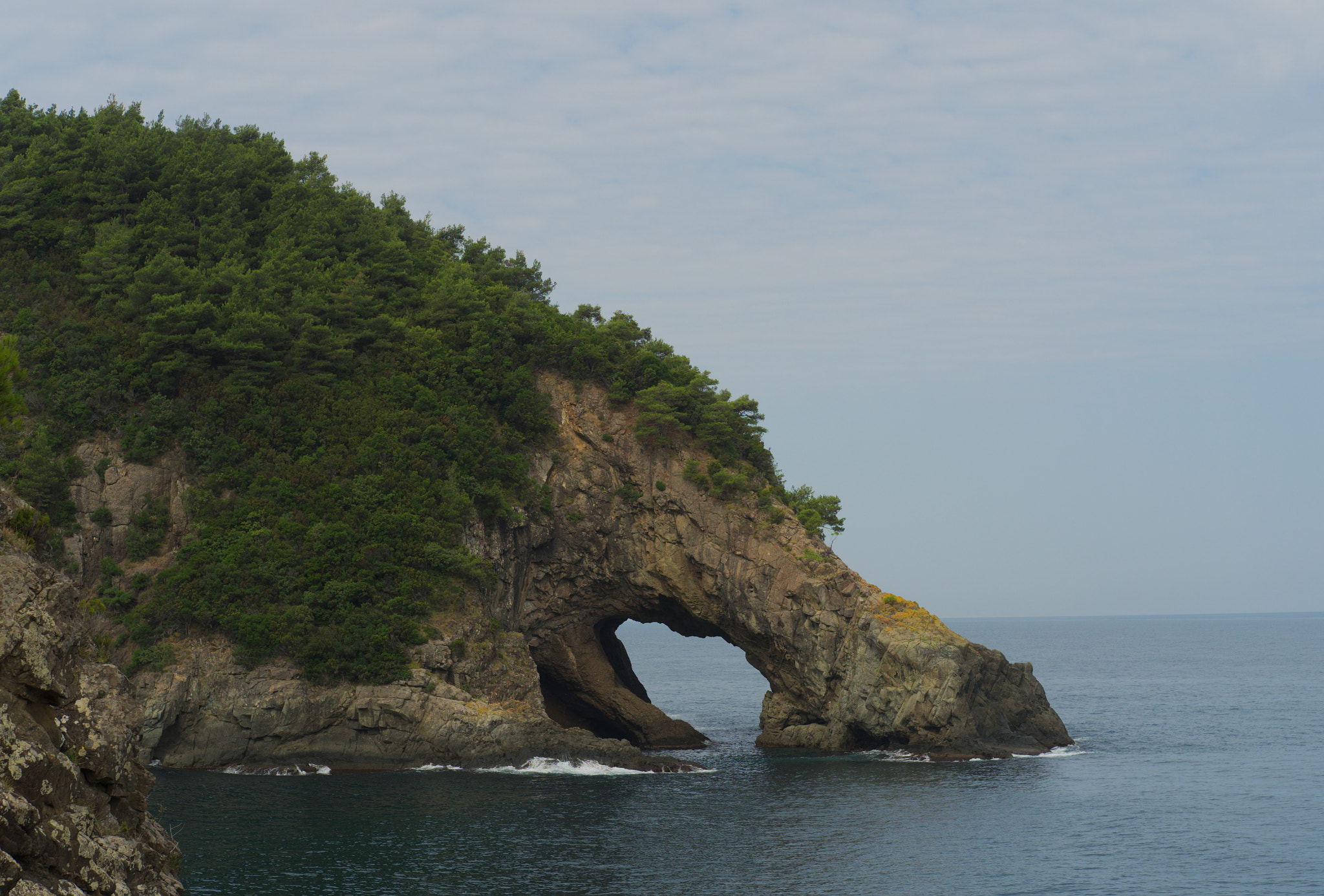 mountain beside sea