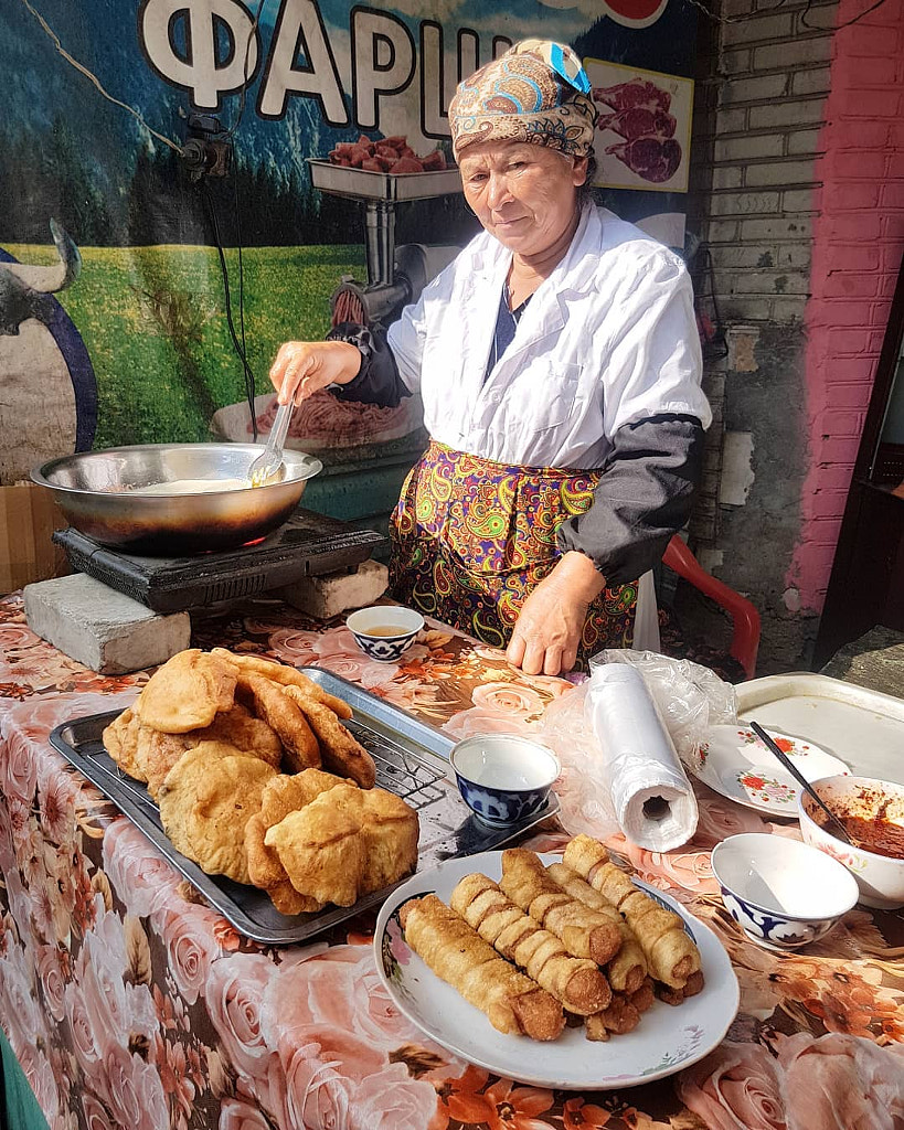 #Woman preparing food in the amazing Jayma Bazaar in Osh Kyrgyzstan.

#DiscoverKyrgyzstan ... by João Leitão on 500px.com