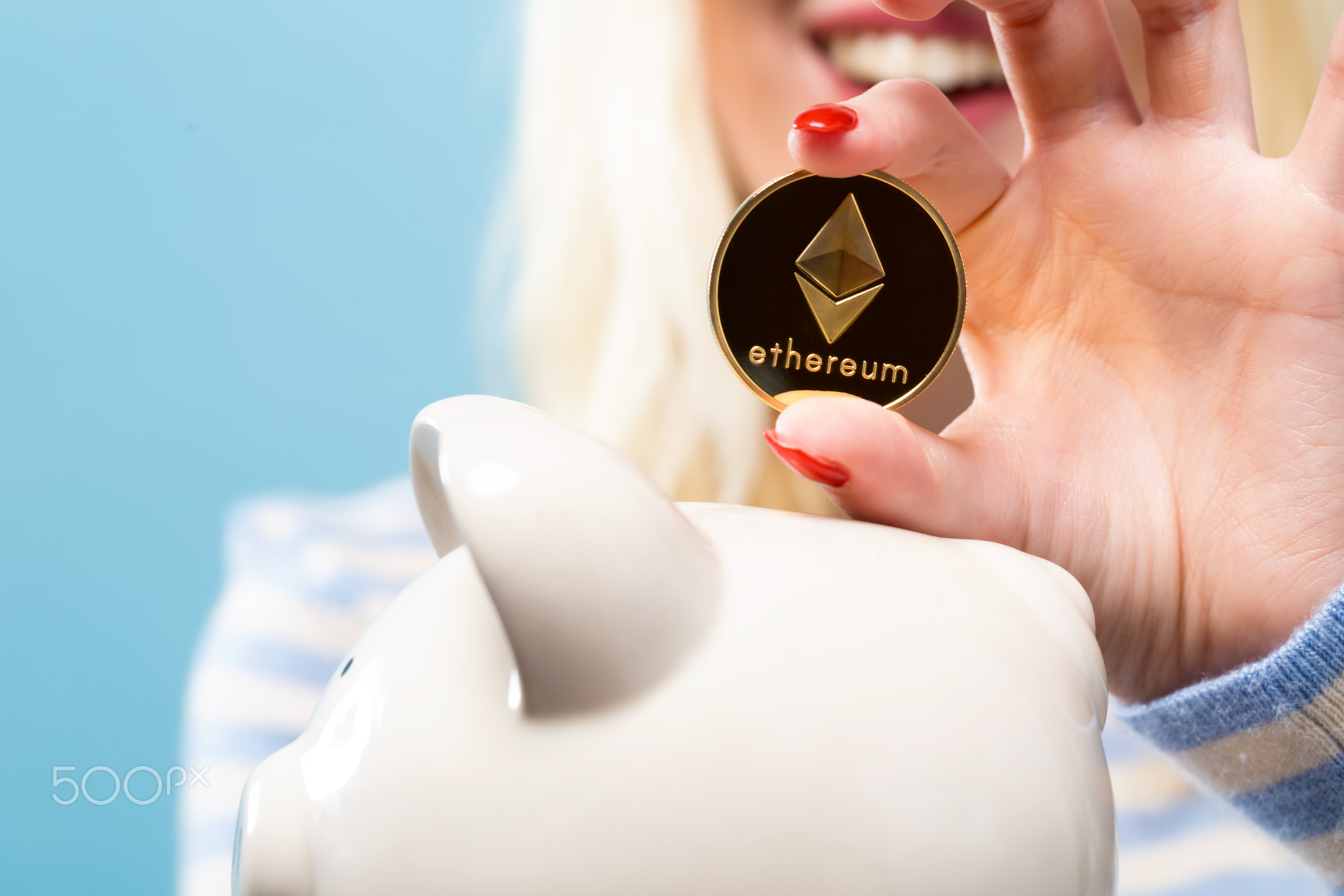 Woman with Ethereum coin and piggy bank