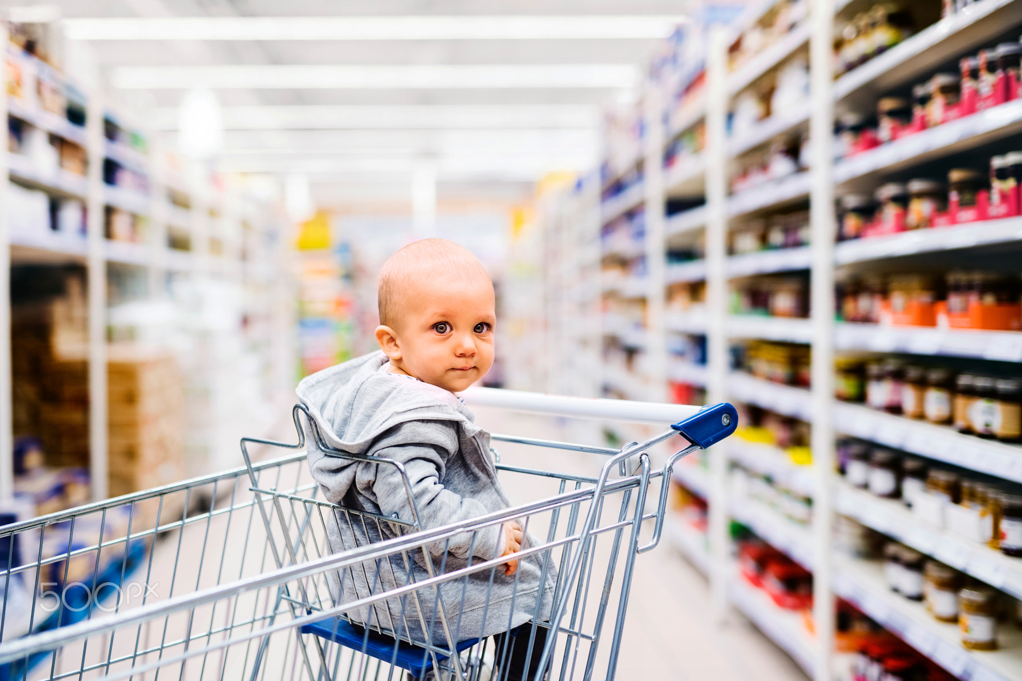 Little baby boy at the supermarket.