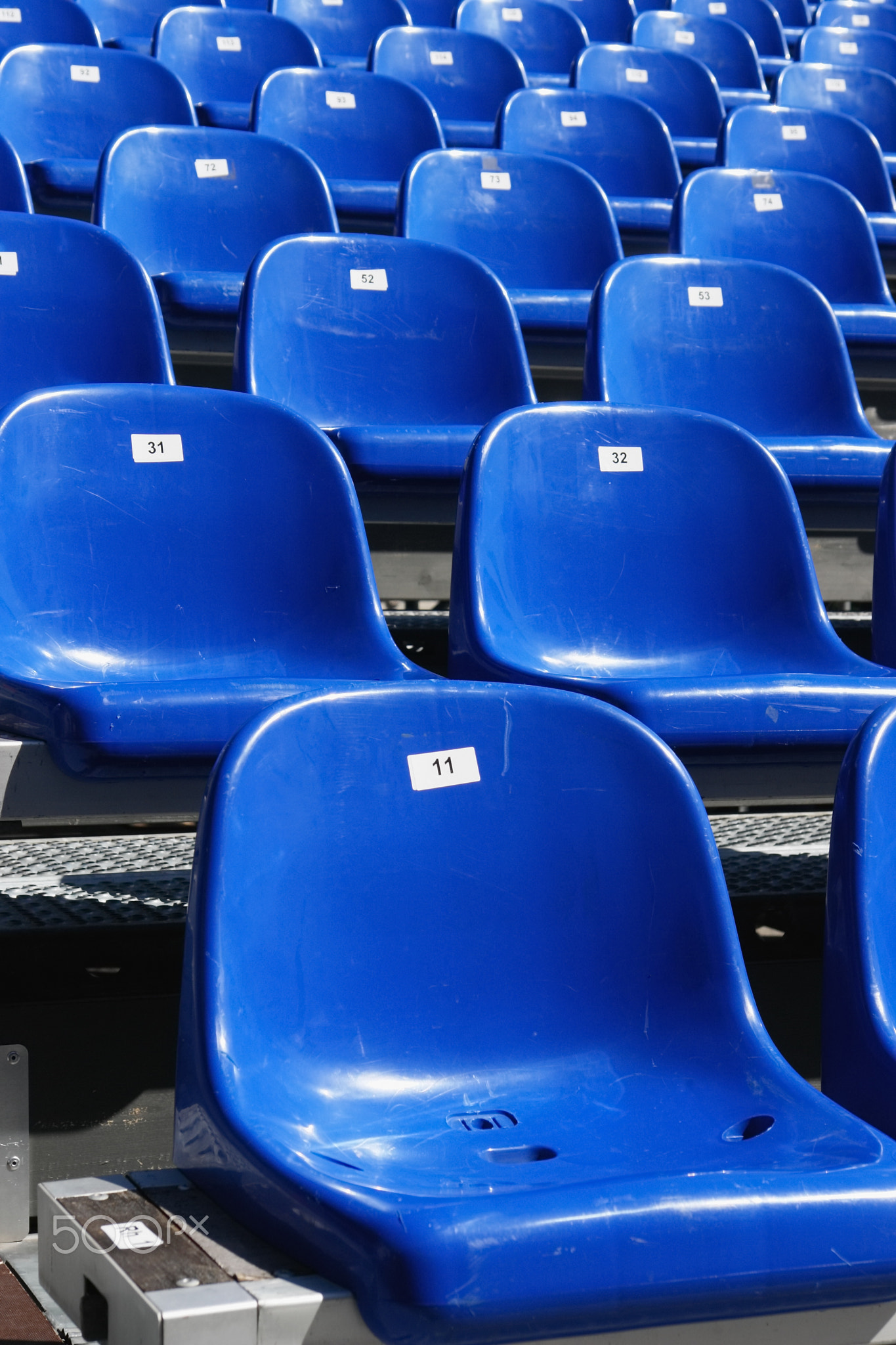 Blue Seats On Stadium