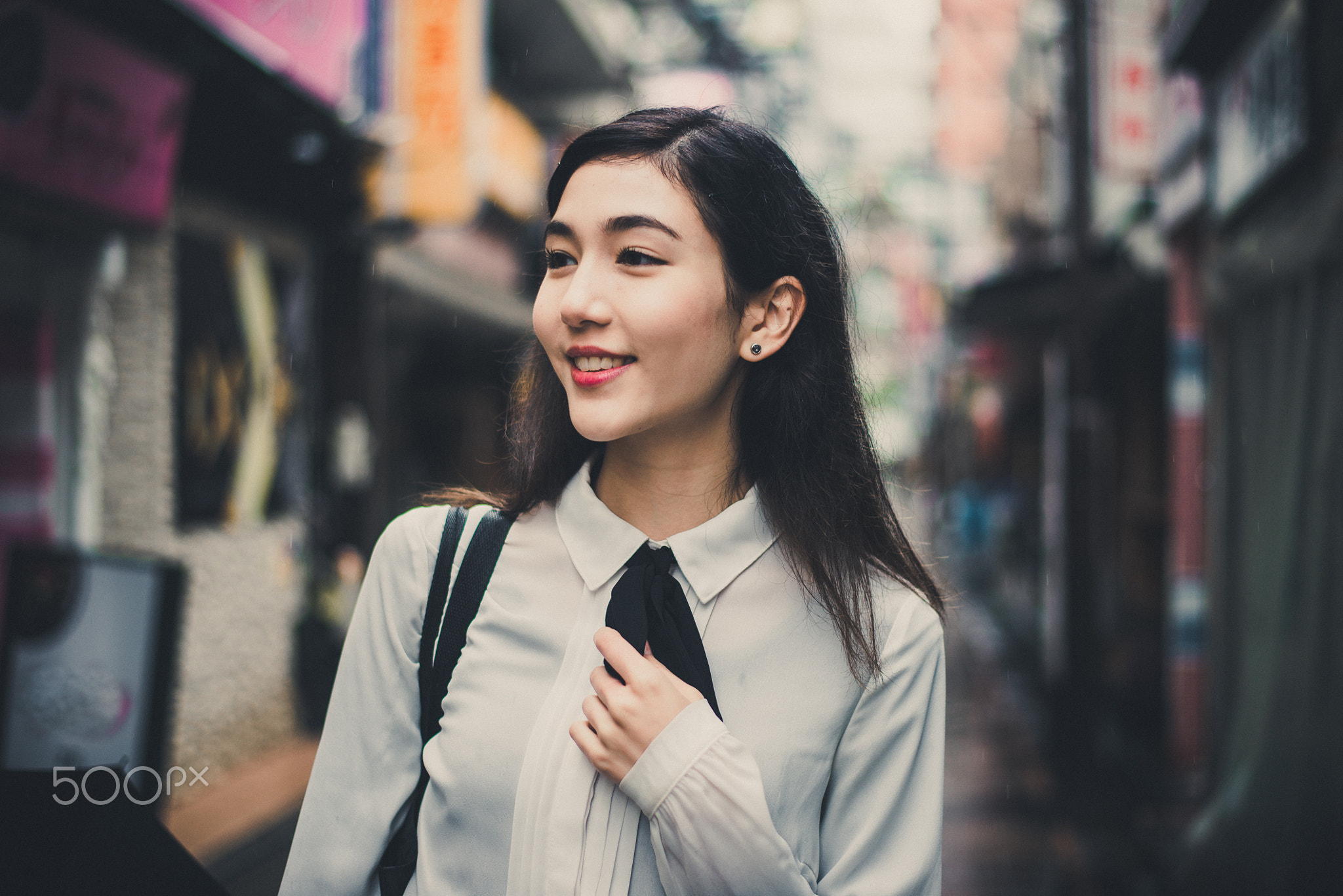 Beautiful japanese girl walking in Tokyo. Concept about teenager