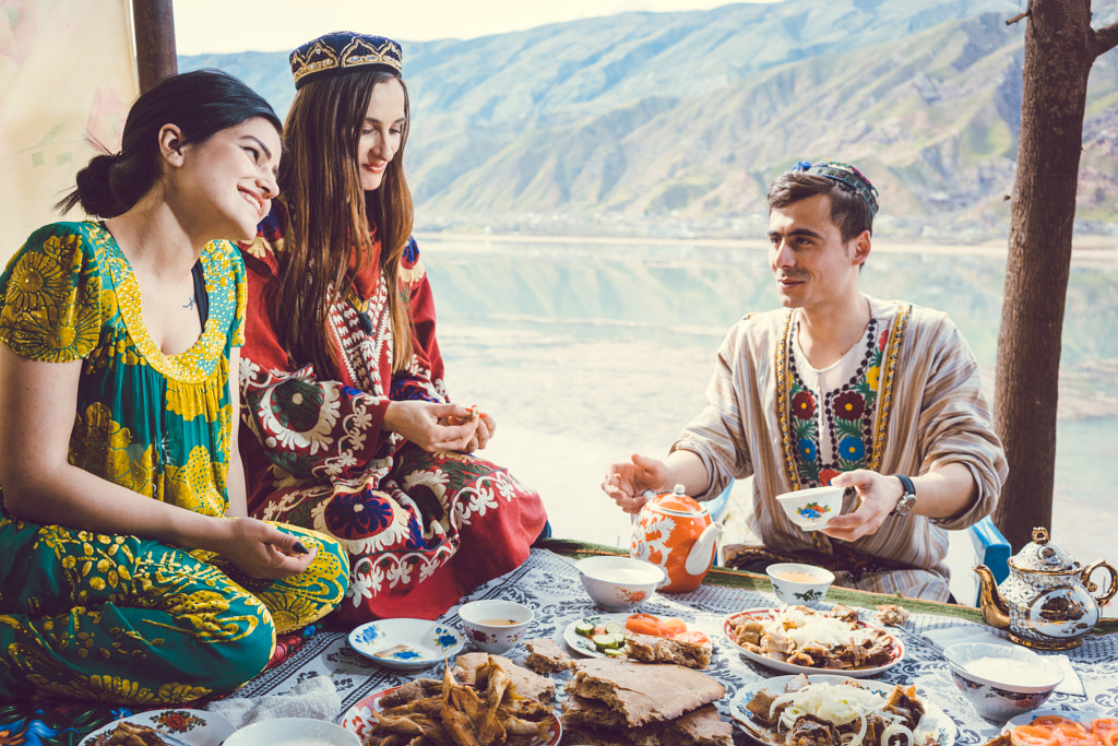 Friends in Tajikistan eating traditional food by Arne Trautmann on 500px.com
