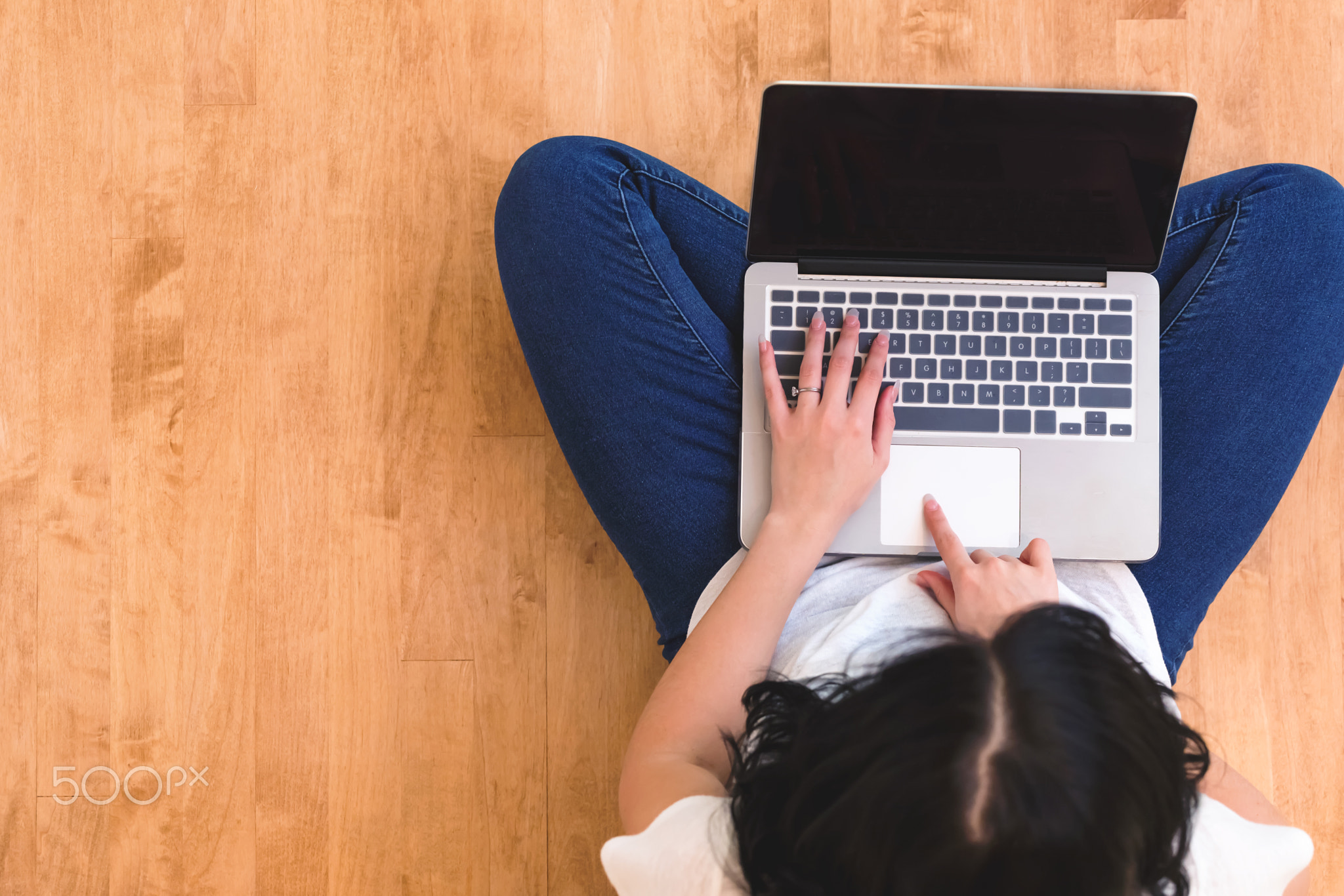 Young woman using her laptop