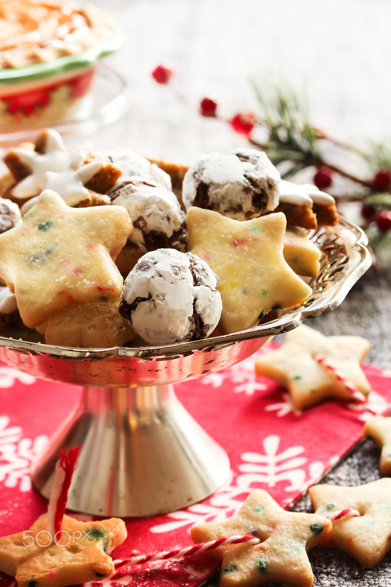 Homemade Xmas cookies, chocolate crinkles,shortbread on festive Christmas frame