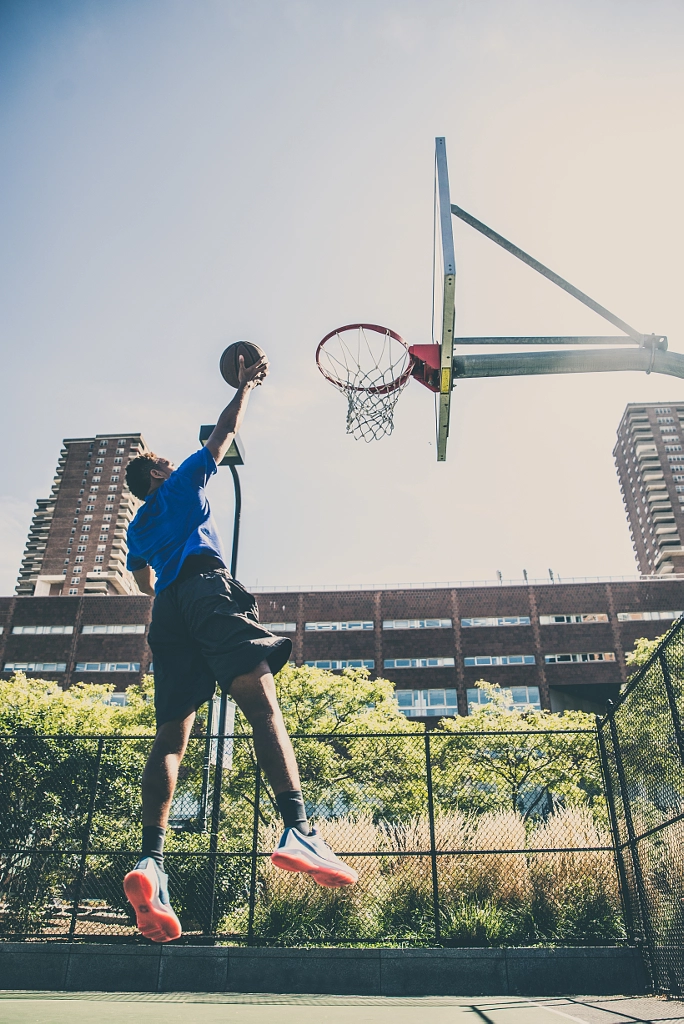 Basketball player playing outdoors by fabio formaggio on 500px.com