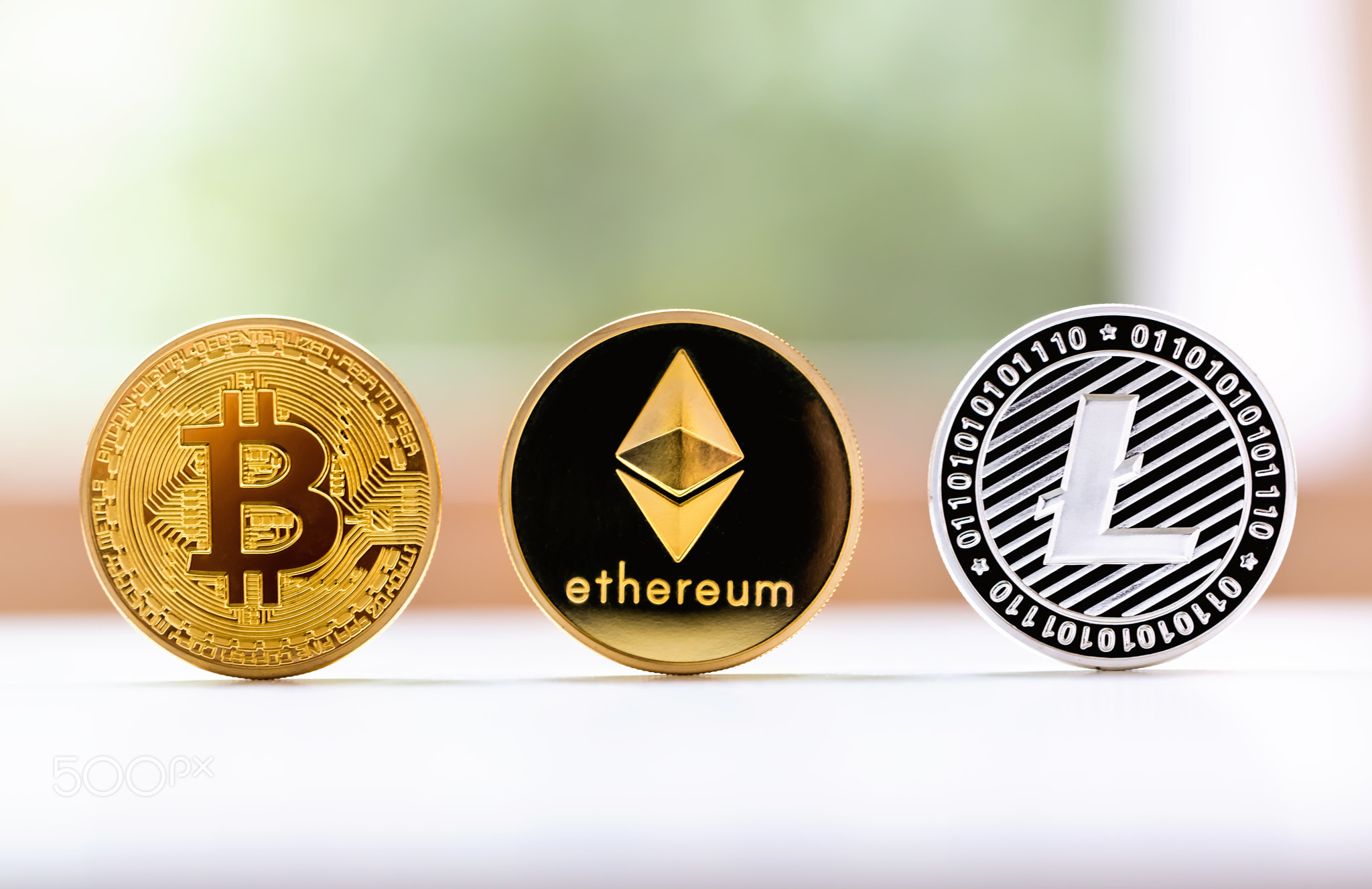 Bitcoin, ethereum and litecoin coins