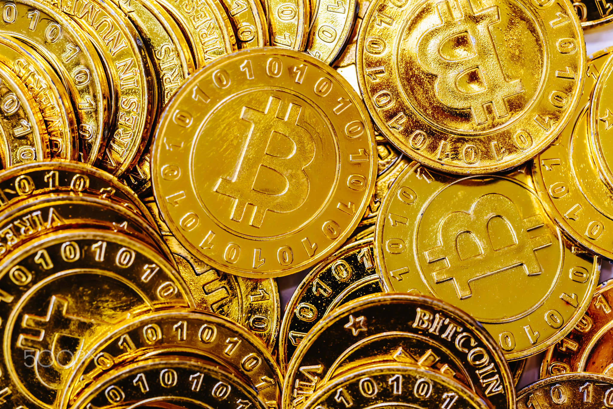 Pile of gold bitcoins
