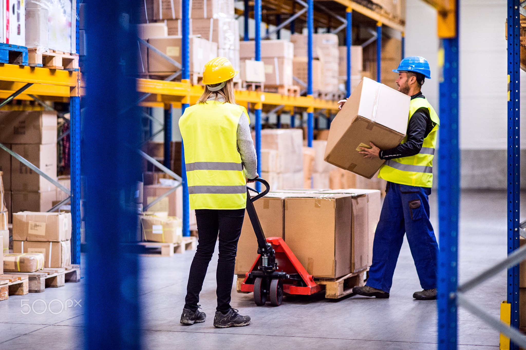 Young workers in a warehouse.