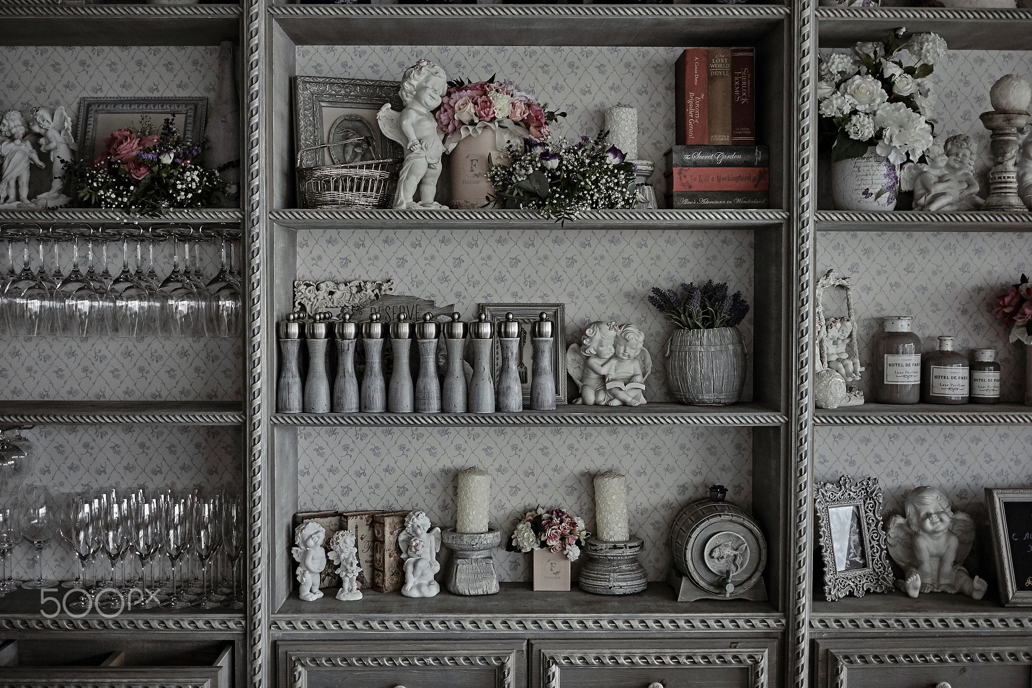 Kitchen utensils in a vintage cabinet in a restaurant