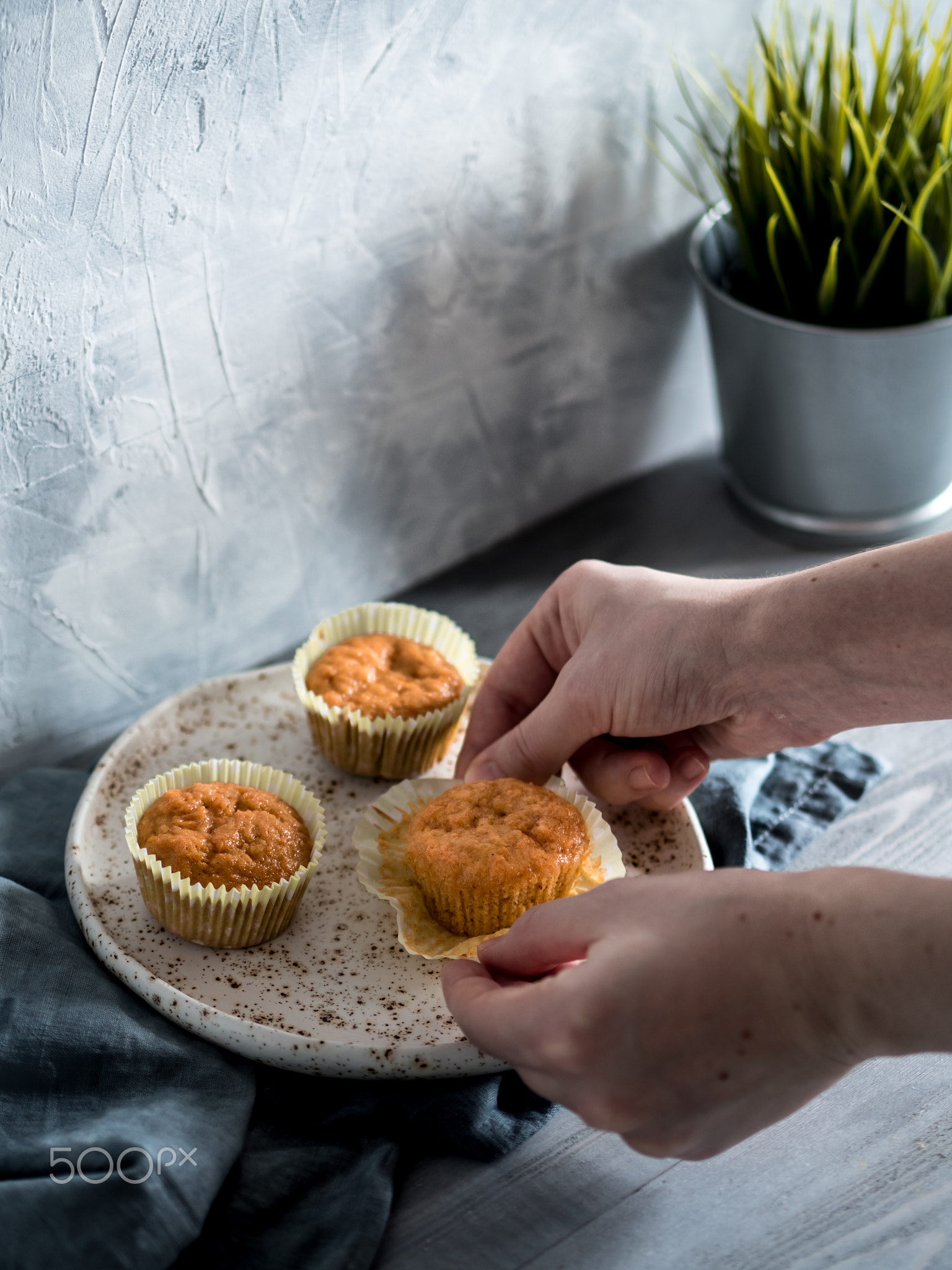 carrot muffins on gray wooden table