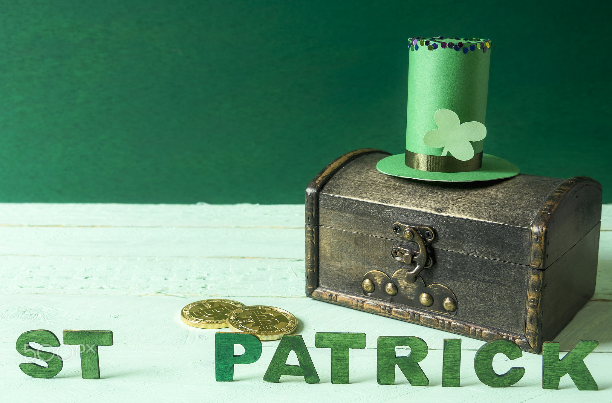 St Patrick words and hat on a treasure chest