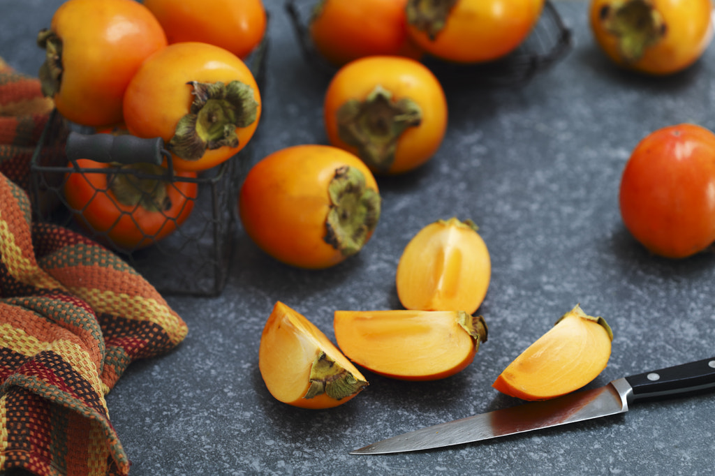 Delicious fresh persimmon fruits. by Anjelika Gretskaia on 500px.com