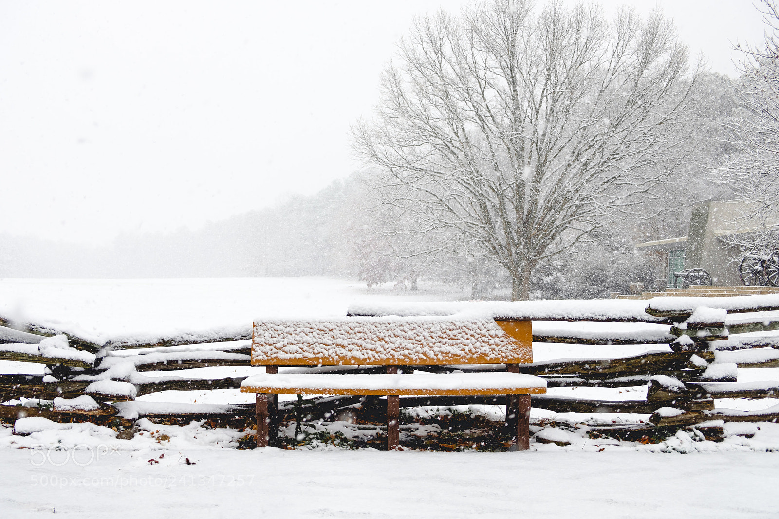 Fujifilm X-T2 sample photo. Lone snowy bench photography