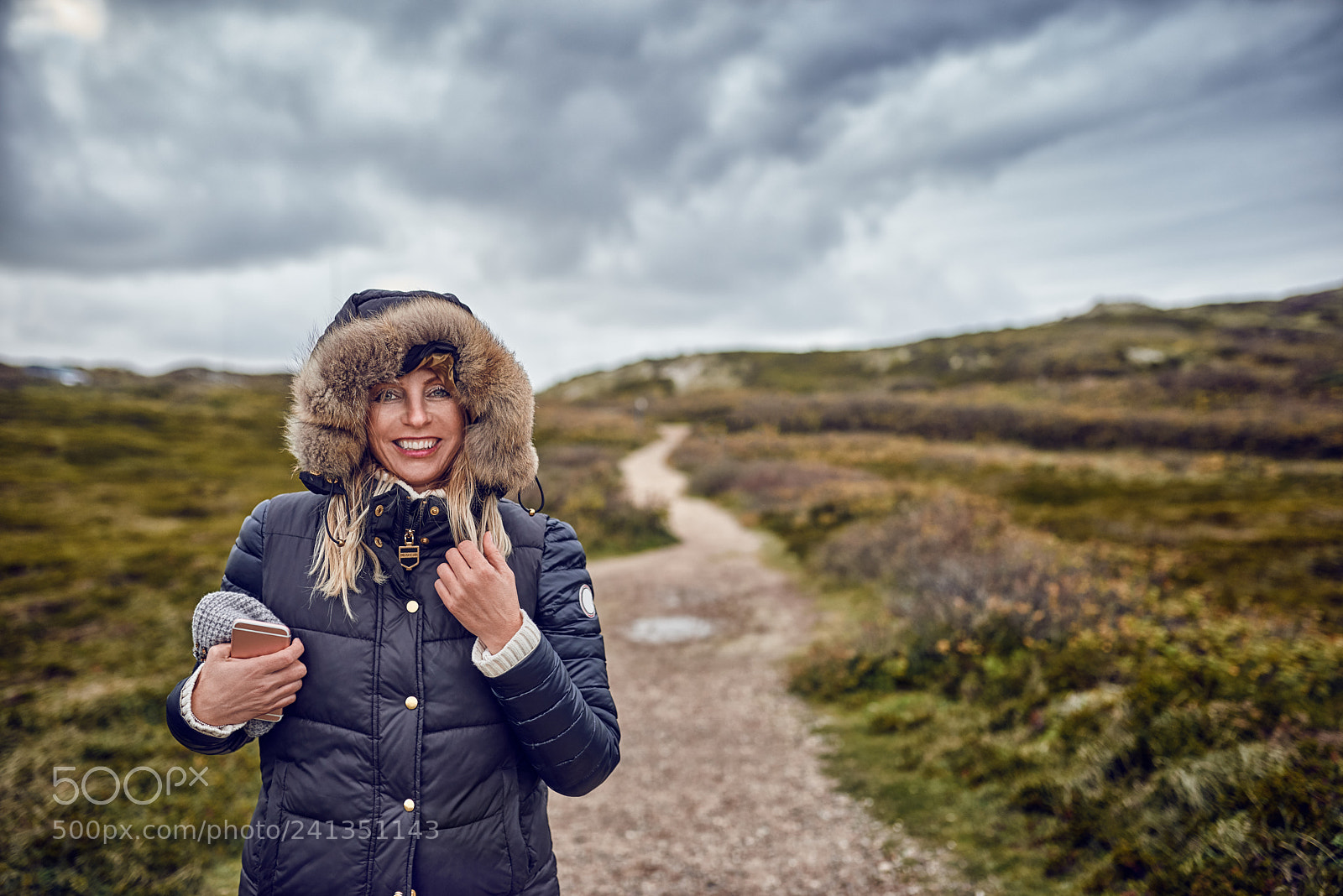 Nikon D800 sample photo. Middle-aged woman braving a photography