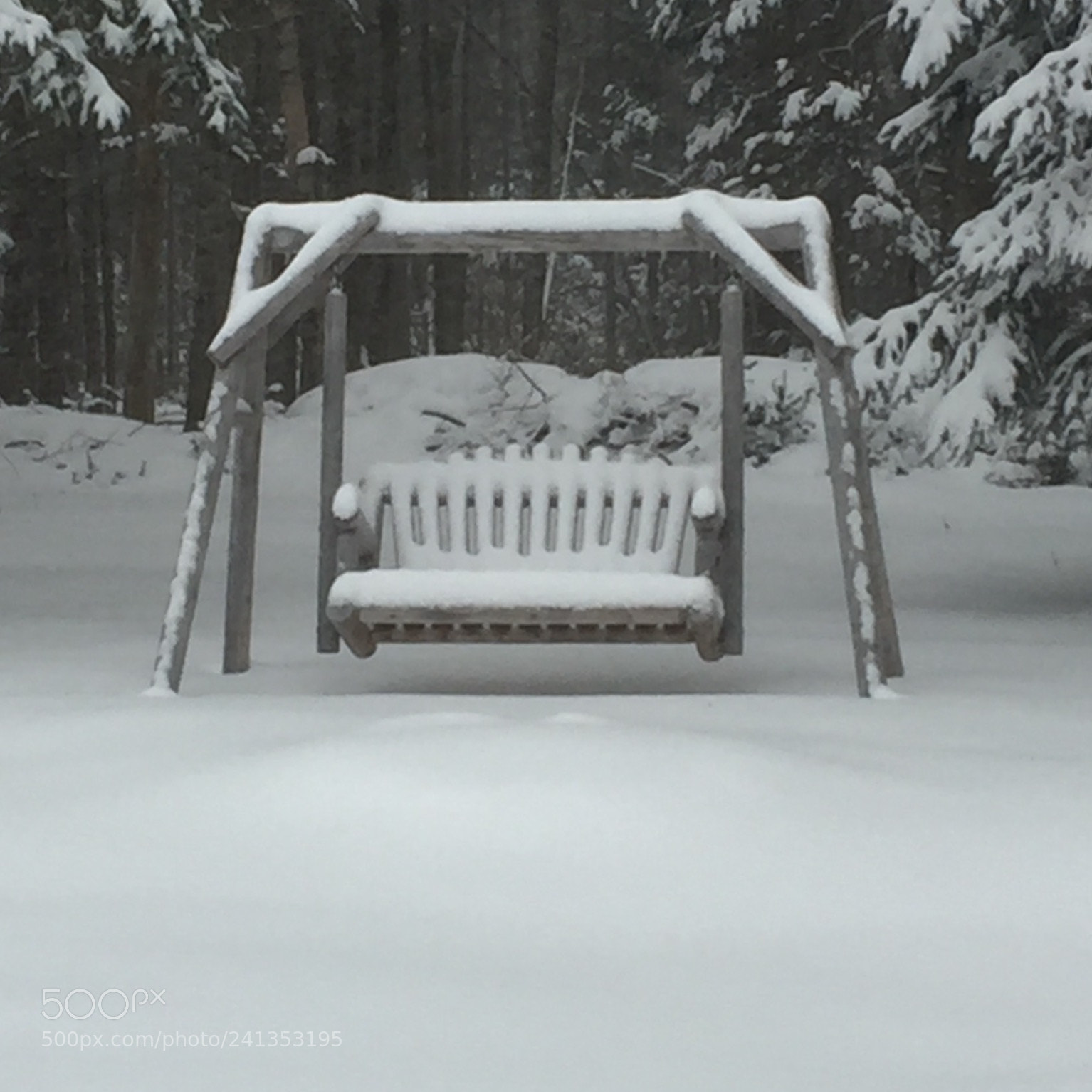 Apple iPhone 6 sample photo. A snow covered swing photography