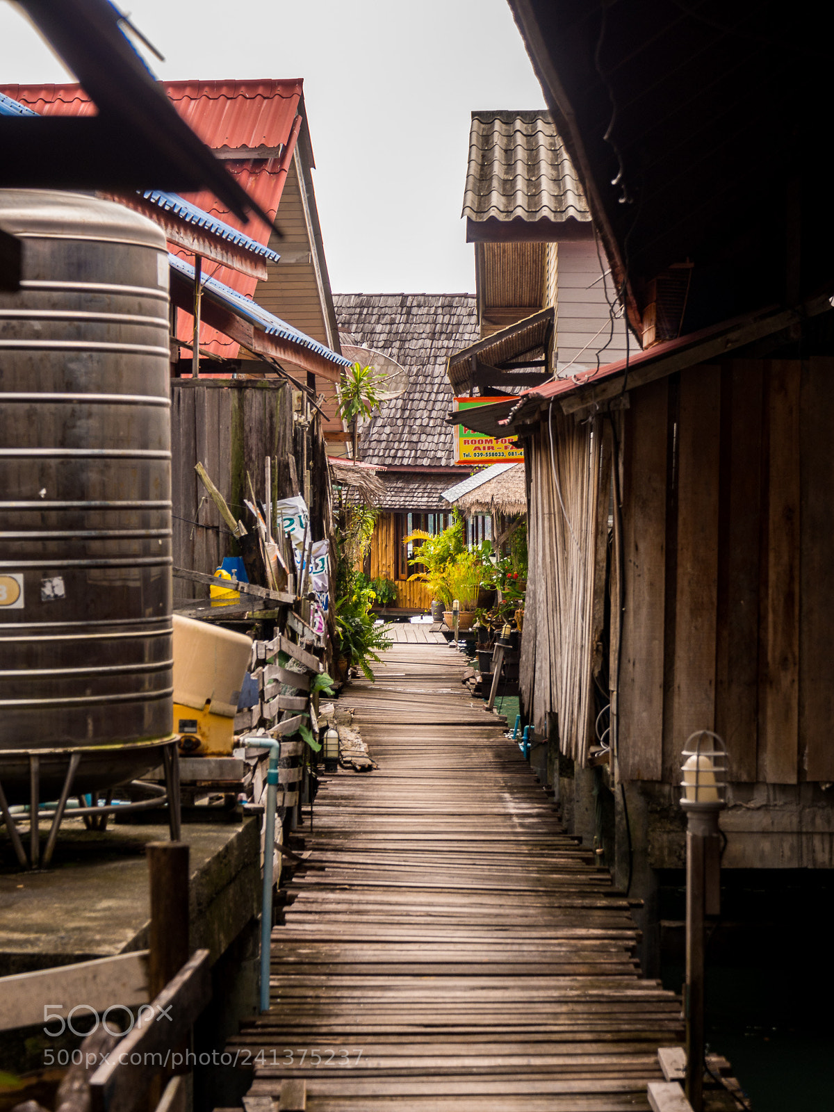 Olympus OM-D E-M10 sample photo. Footbridge between the stilt photography
