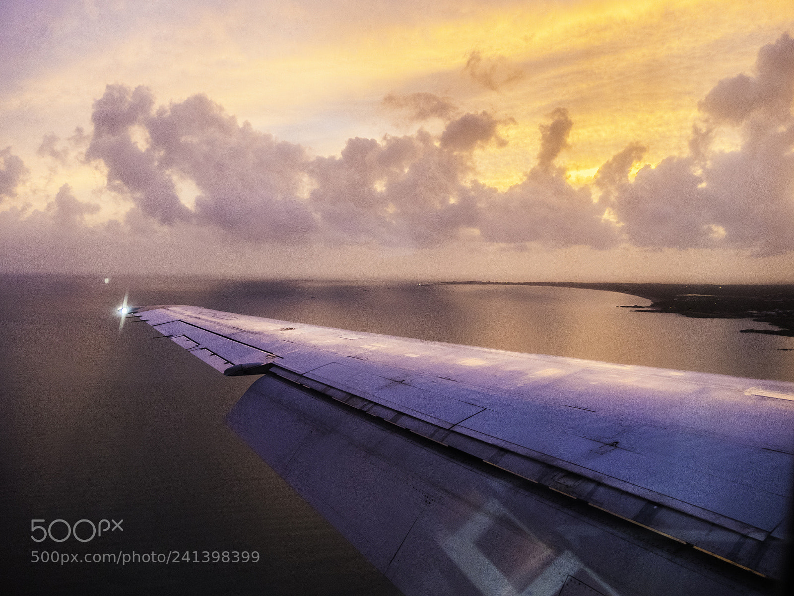 Panasonic Lumix DMC-GX8 sample photo. Sunset over plane wing photography