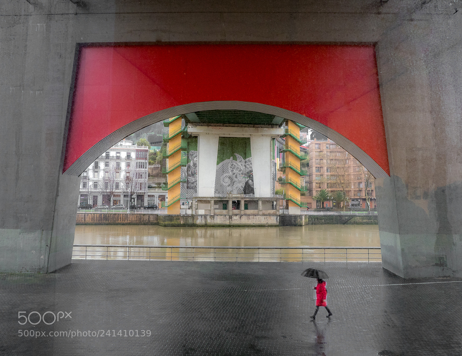 Olympus OM-D E-M1 Mark II sample photo. Red coated walker under photography