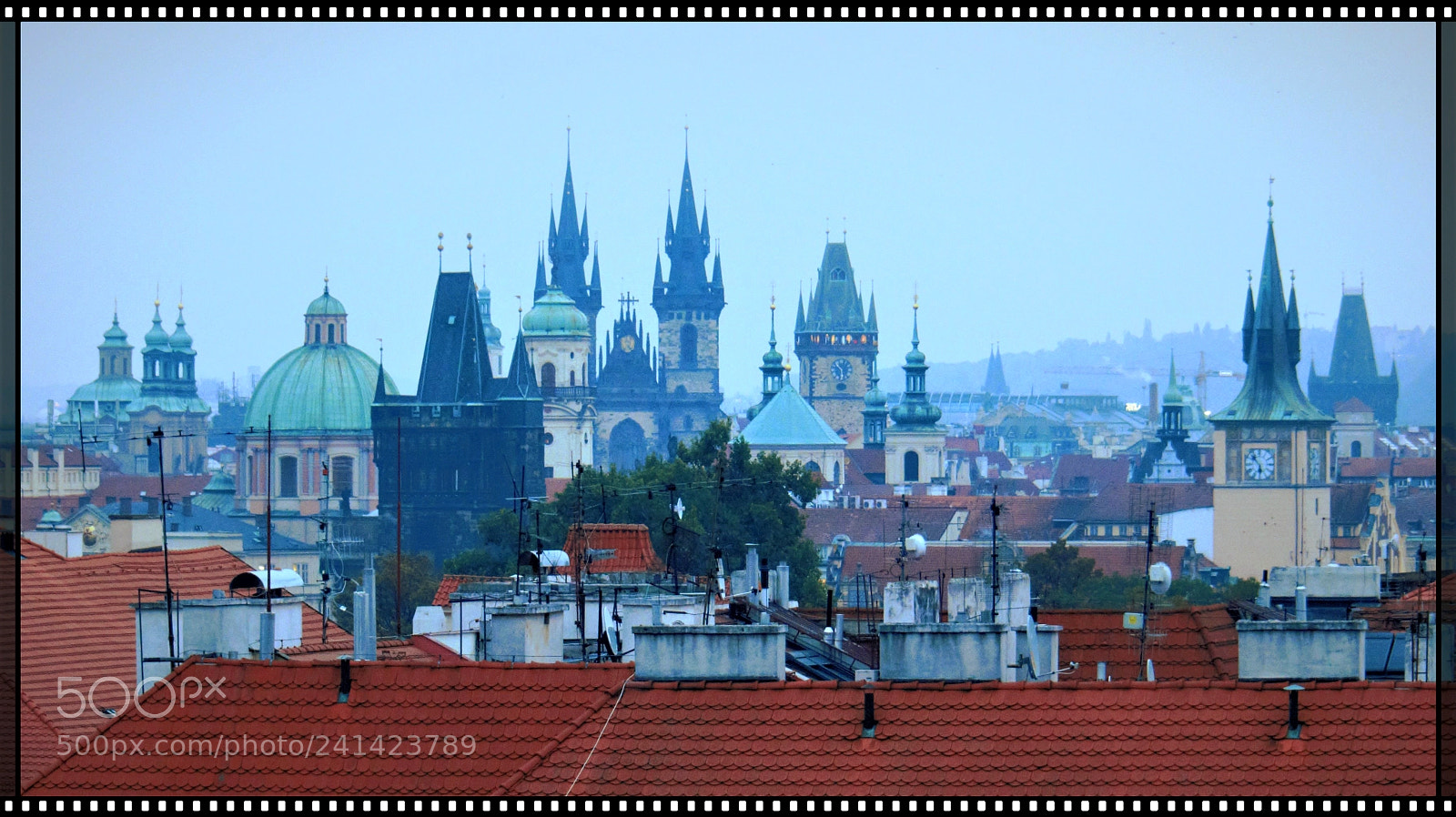 Panasonic Lumix DMC-FZ200 sample photo. Prague = towers + roofs photography