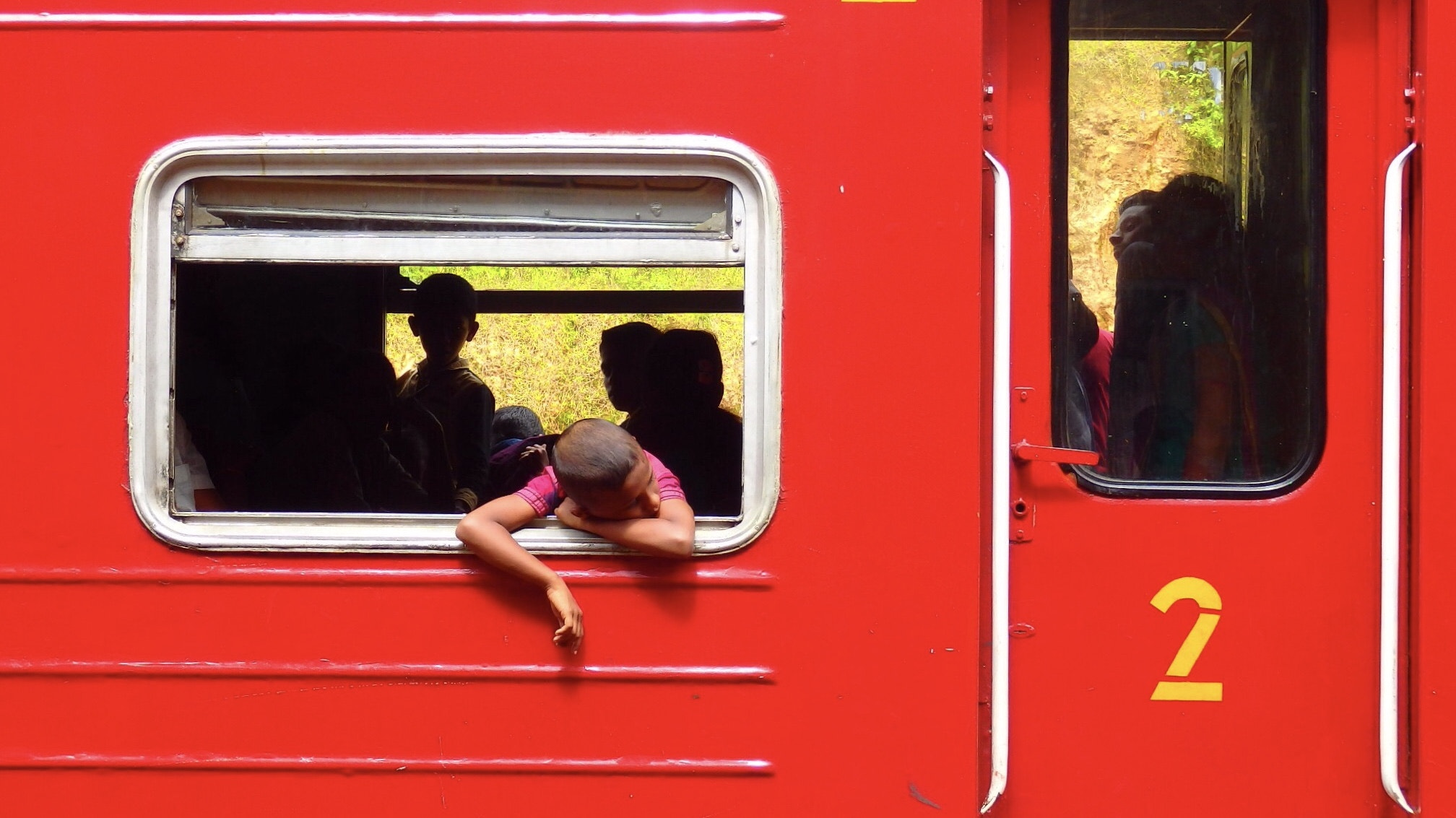 Olympus SH-1 sample photo. The boy on the train photography