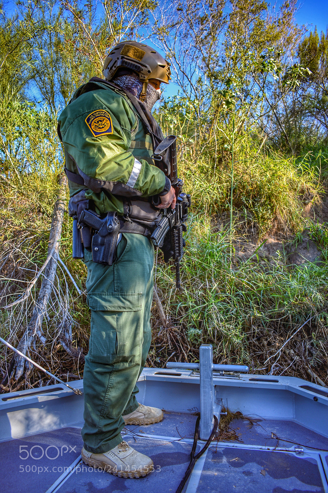 Nikon D3400 sample photo. Border patrol agent with photography