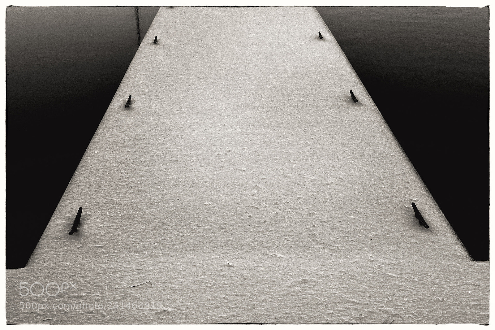 Sony Cyber-shot DSC-RX10 III sample photo. "pier in snow" photography