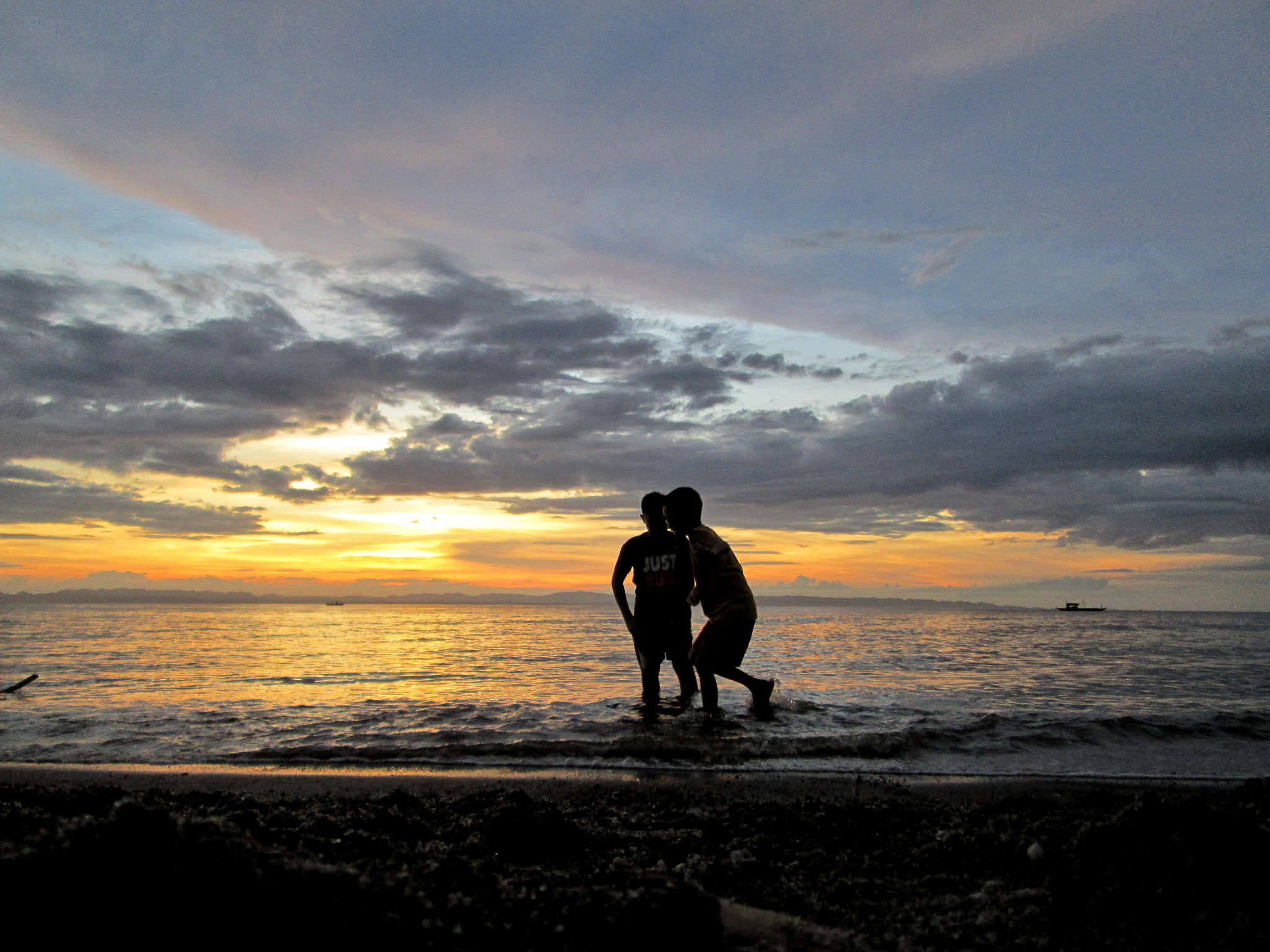 Canon PowerShot A2400 IS sample photo. Brothers playing in the sunset photography