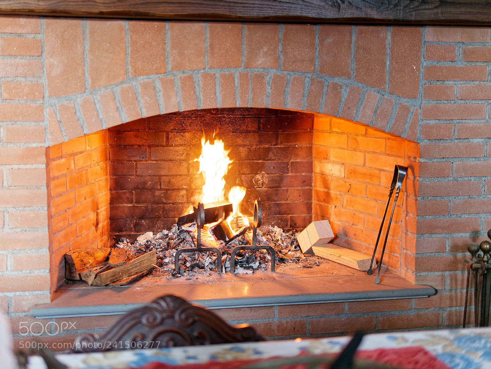 Panasonic Lumix DMC-GX85 (Lumix DMC-GX80 / Lumix DMC-GX7 Mark II) sample photo. Fireplace with warm fire photography