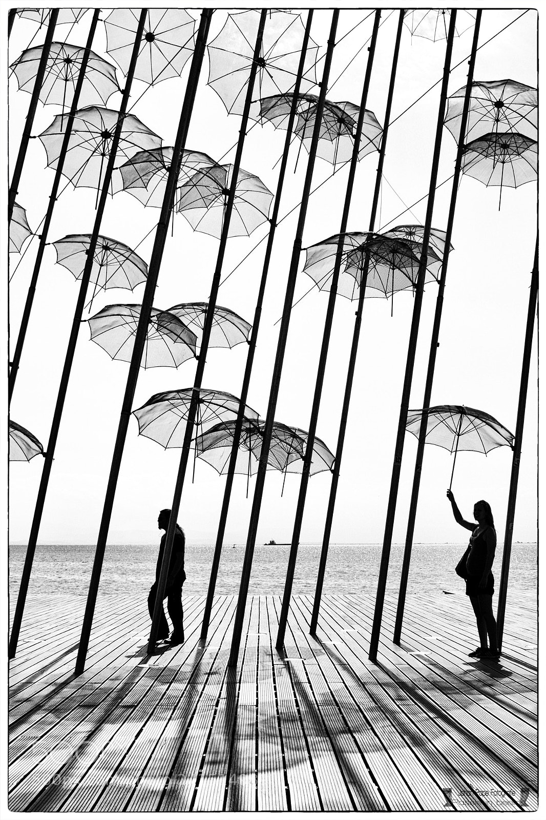 Canon EOS 1000D (EOS Digital Rebel XS / EOS Kiss F) sample photo. Umbrella sculpture thessaloniki photography