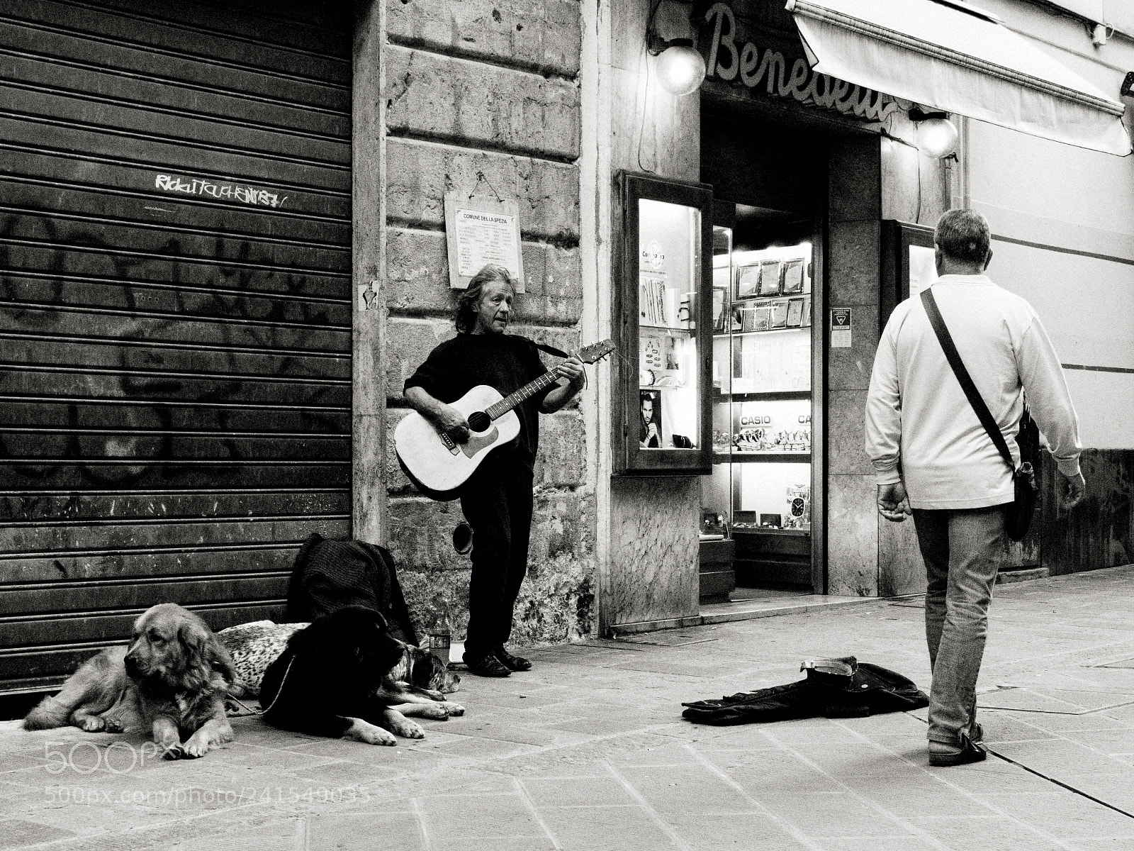 Sony a6500 sample photo. Busking to feed his photography