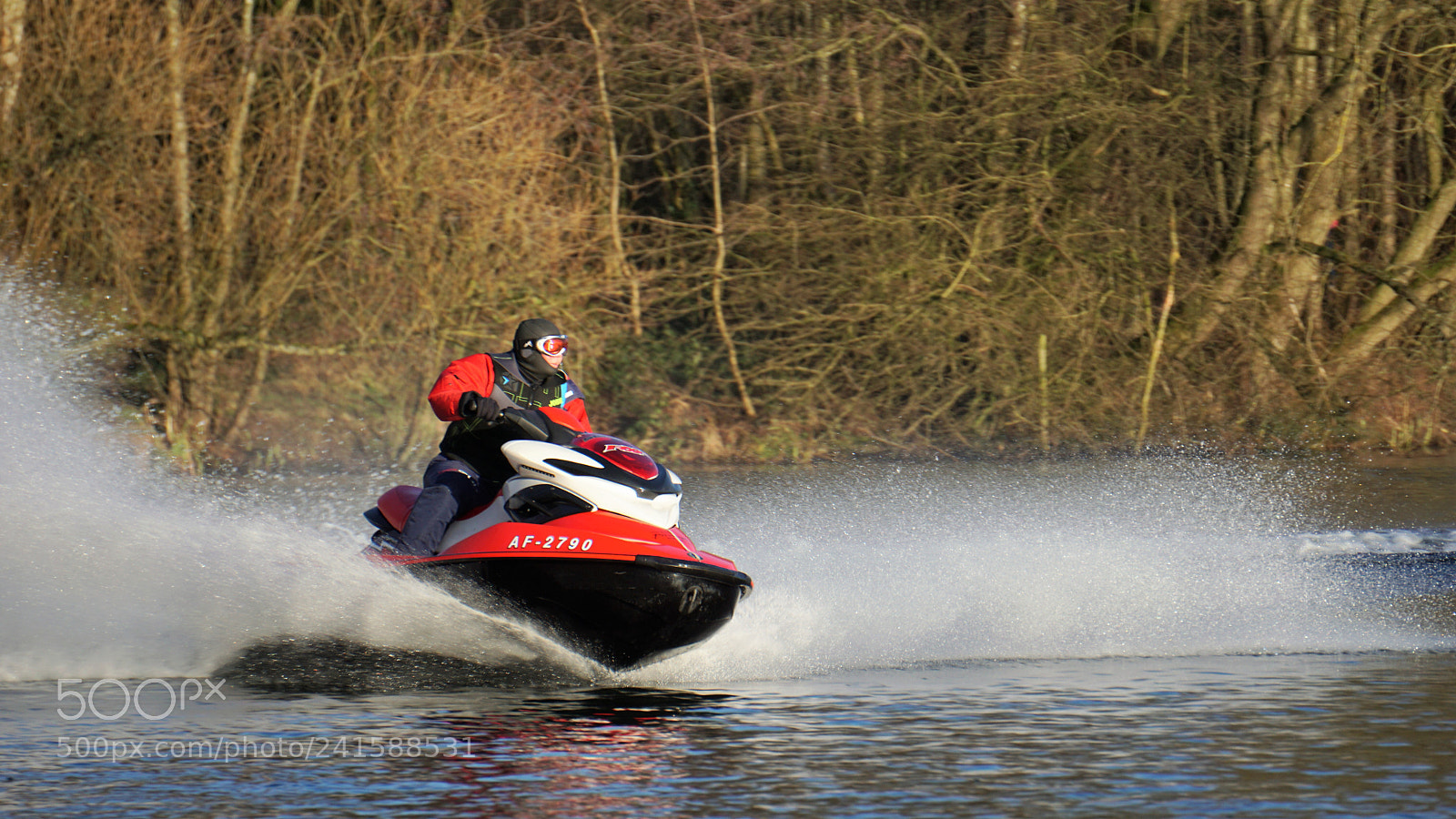 Sony E 55-210mm F4.5-6.3 OSS sample photo. Jet ski rider. photography