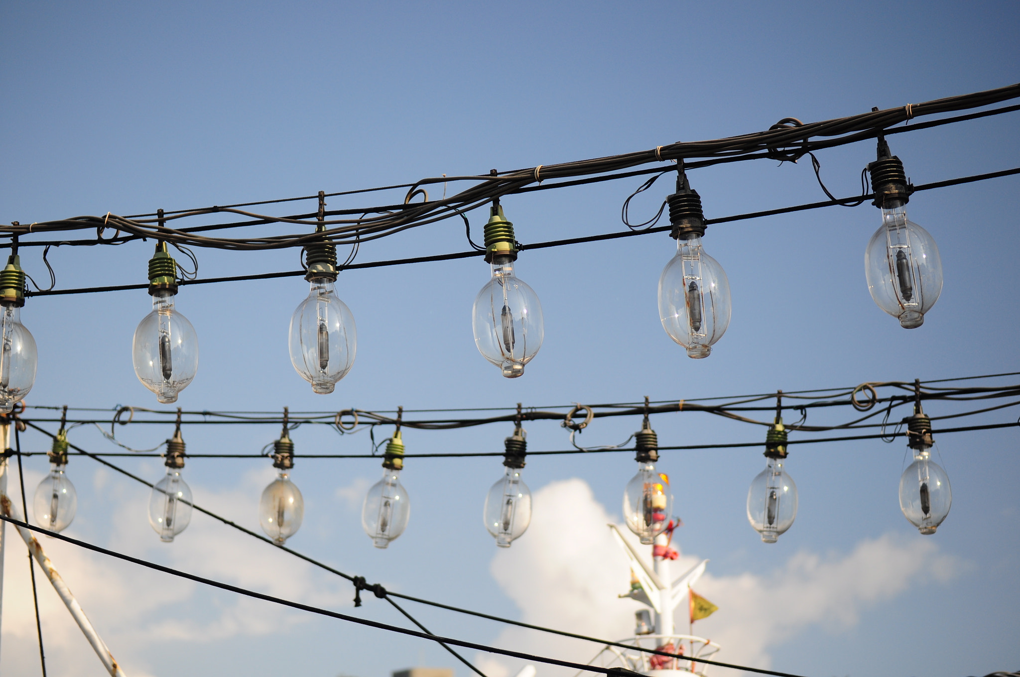 Nikon D5000 sample photo. Bulbs on fishing boat photography