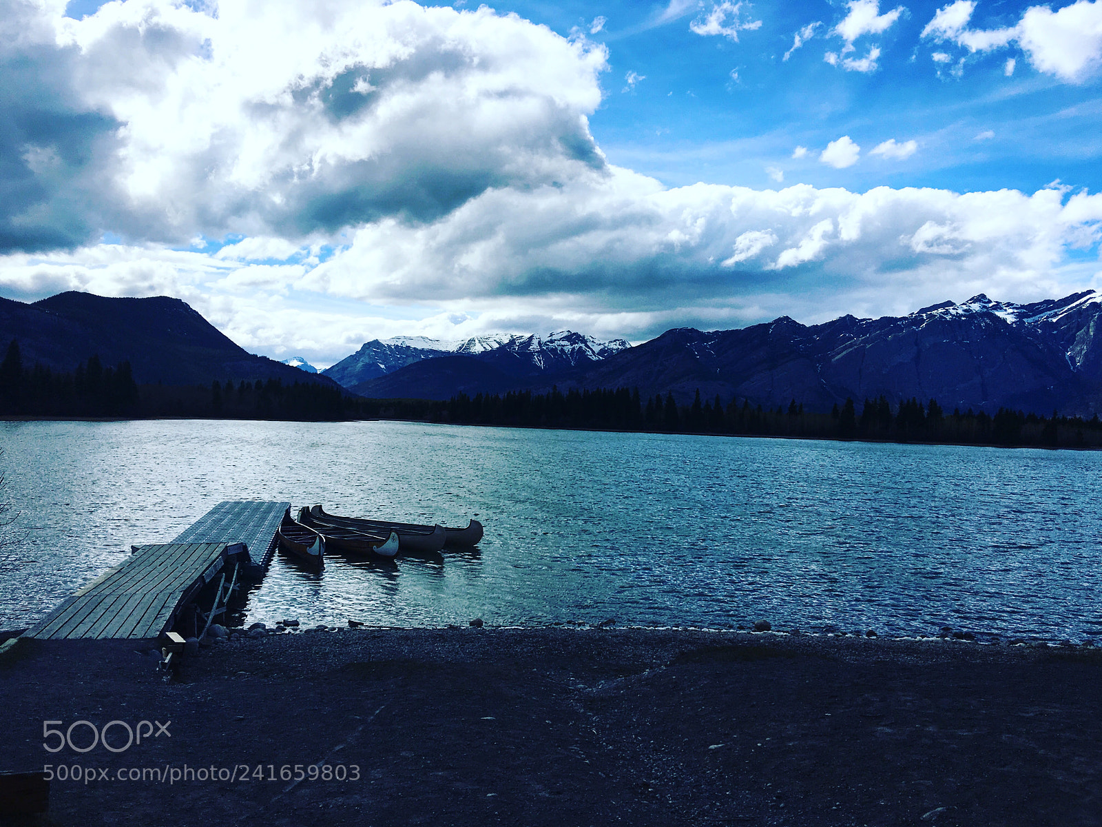 Apple iPhone 6s Plus sample photo. Canoes on a lake photography