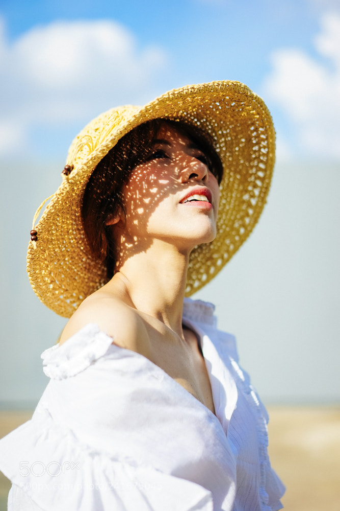 Sony a7 sample photo. Hat and cloud photography