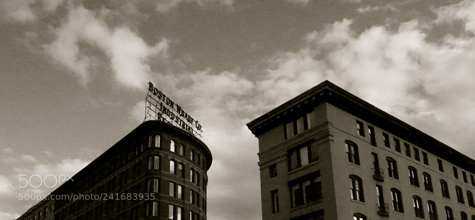 Sony Alpha NEX-3N sample photo. Dueling buildings photography